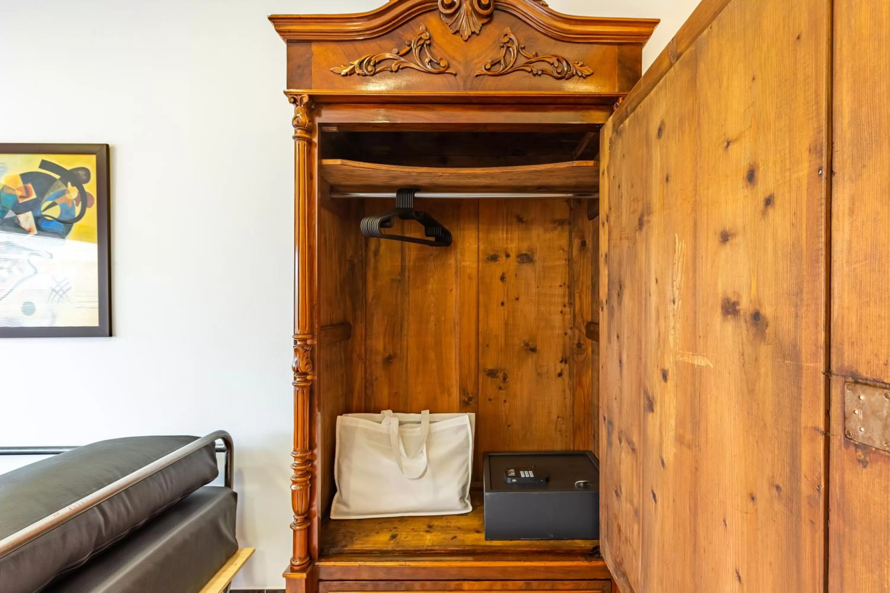 wardrobe in Villa Pera Suite Hotel