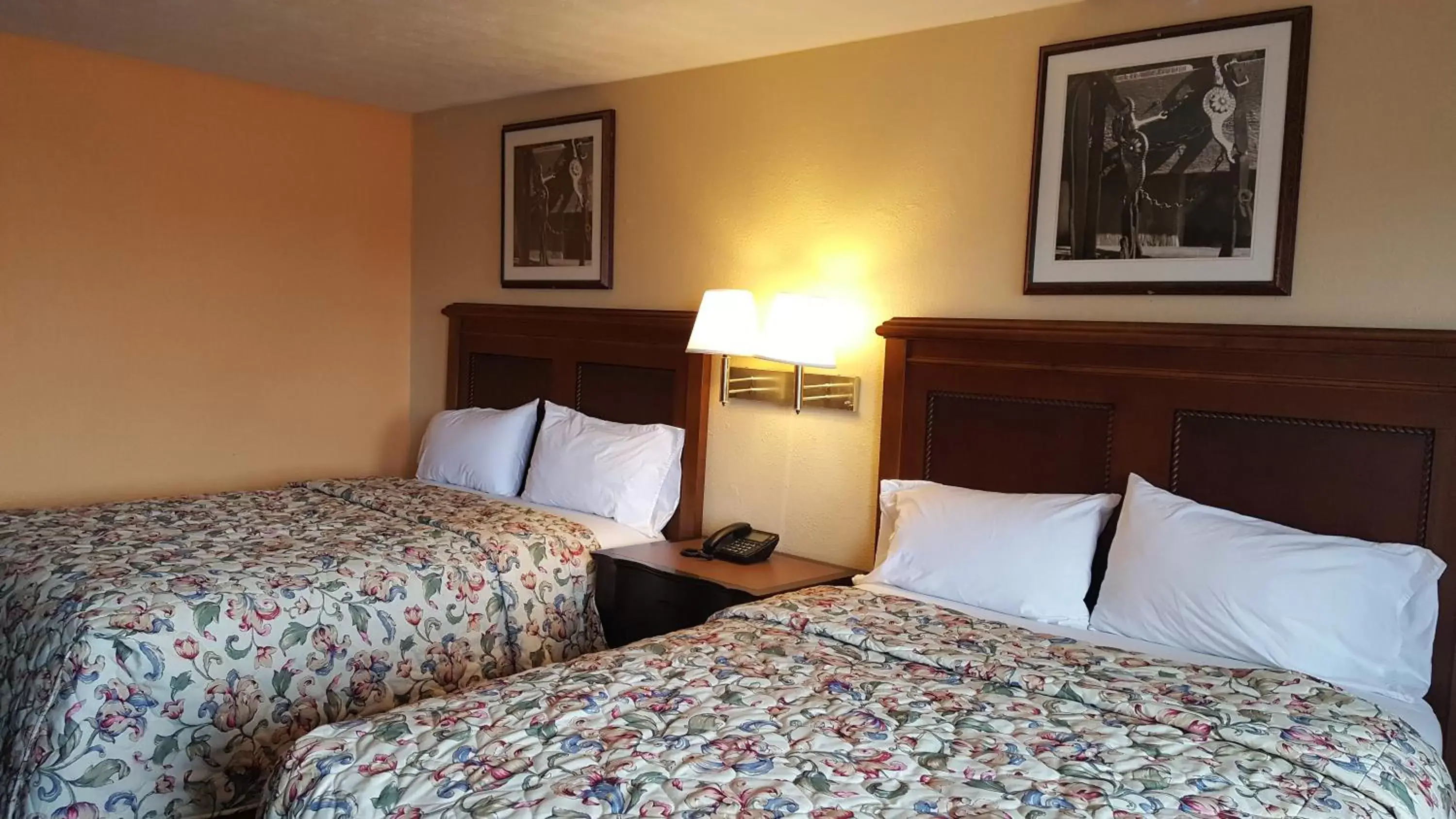 Bed in Garden Inn and Extended Stay