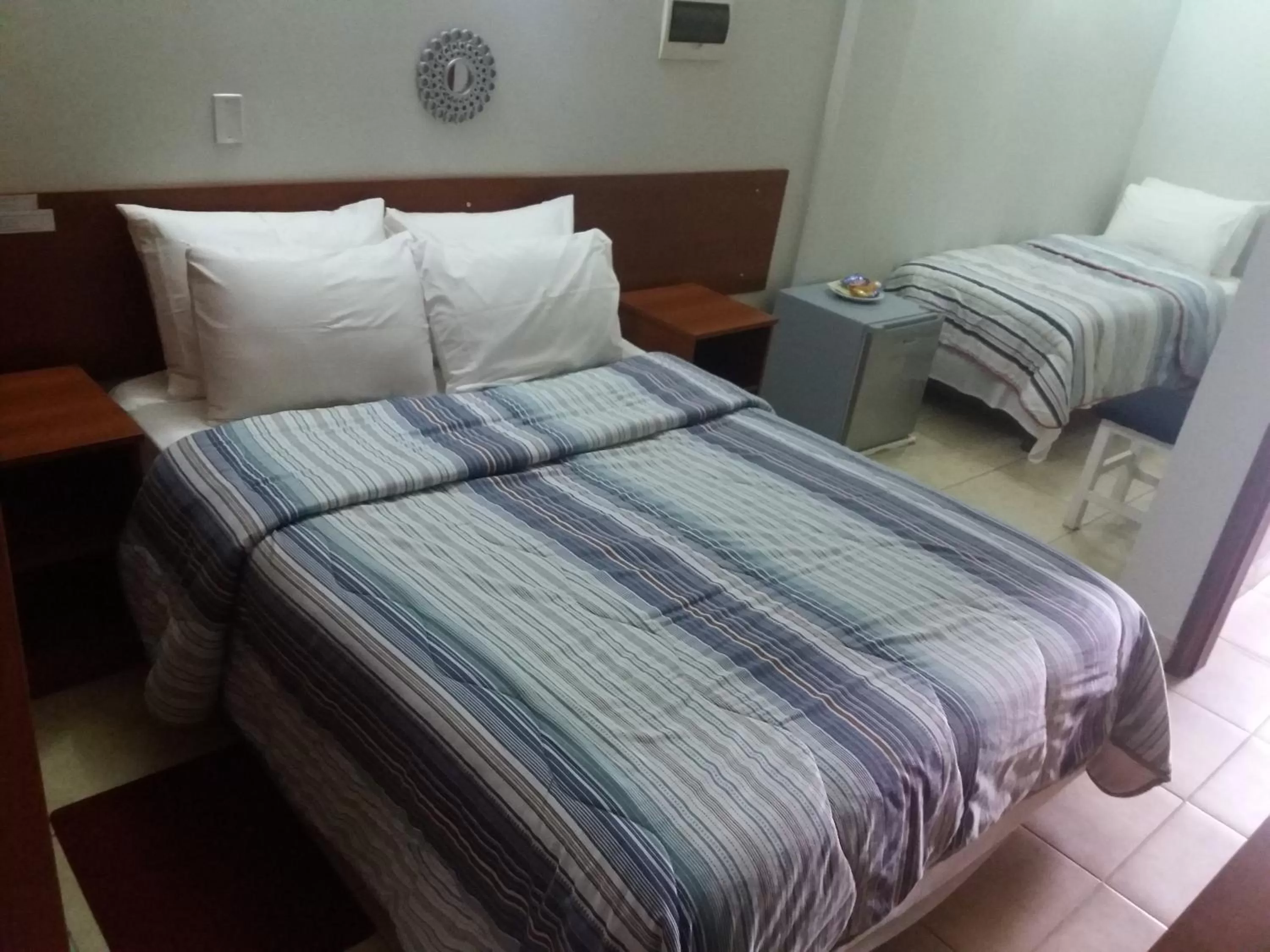 Bed in Madame Lynch Hotel Asuncion