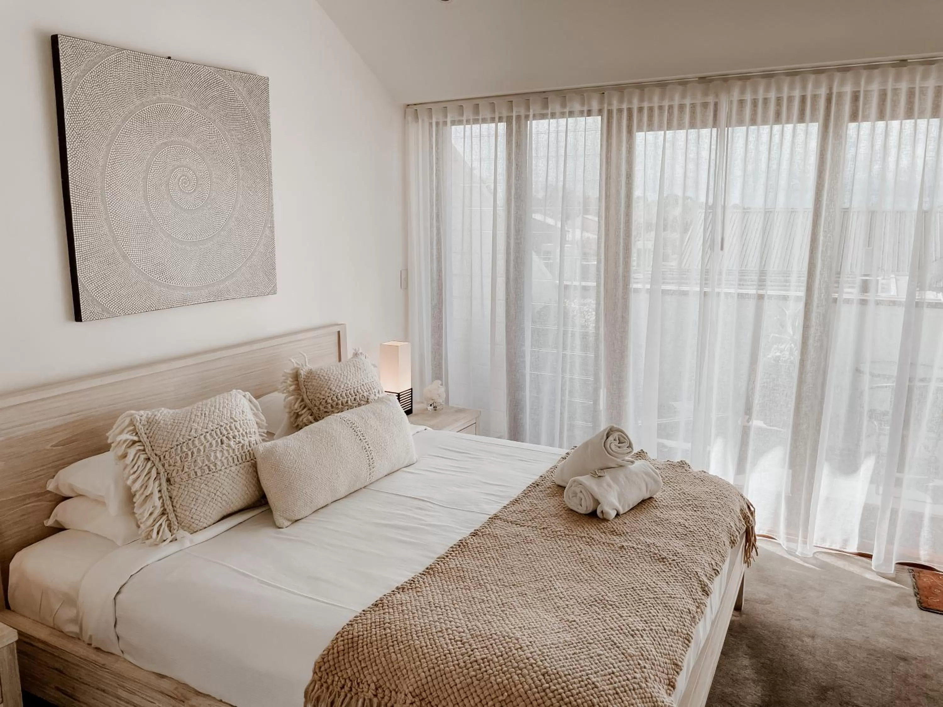 Bed in Byron Butter Factory Apartments