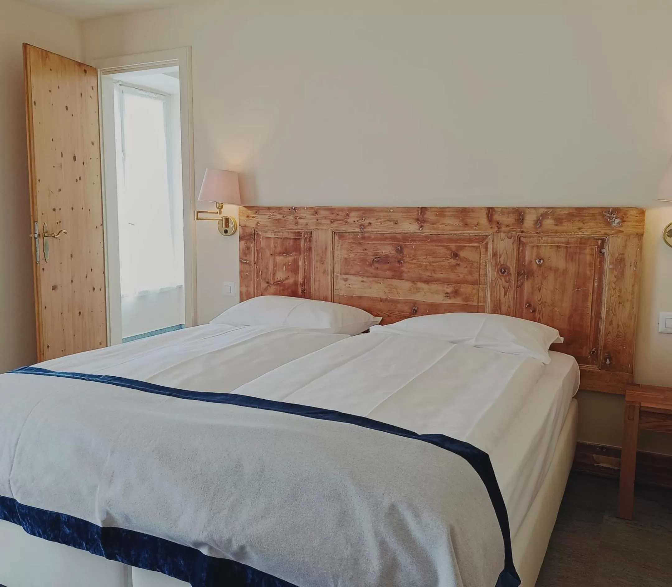 Bed in Hotel Bernina 1865 by Kleos Group Collection