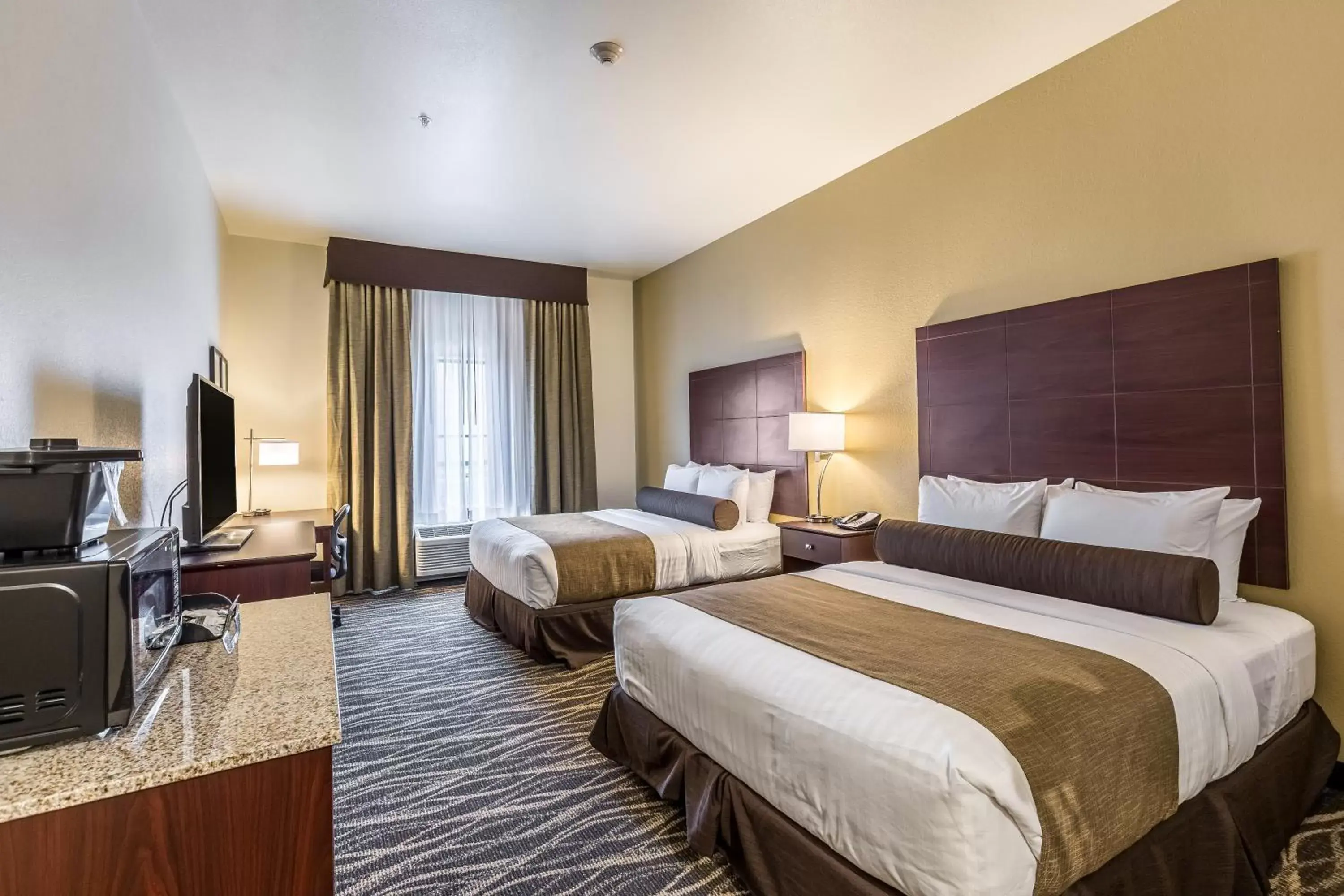 Bed in Cobblestone Hotel & Suites - Stevens Point Bed in Cobblestone Hotel & Suites - Stevens Point