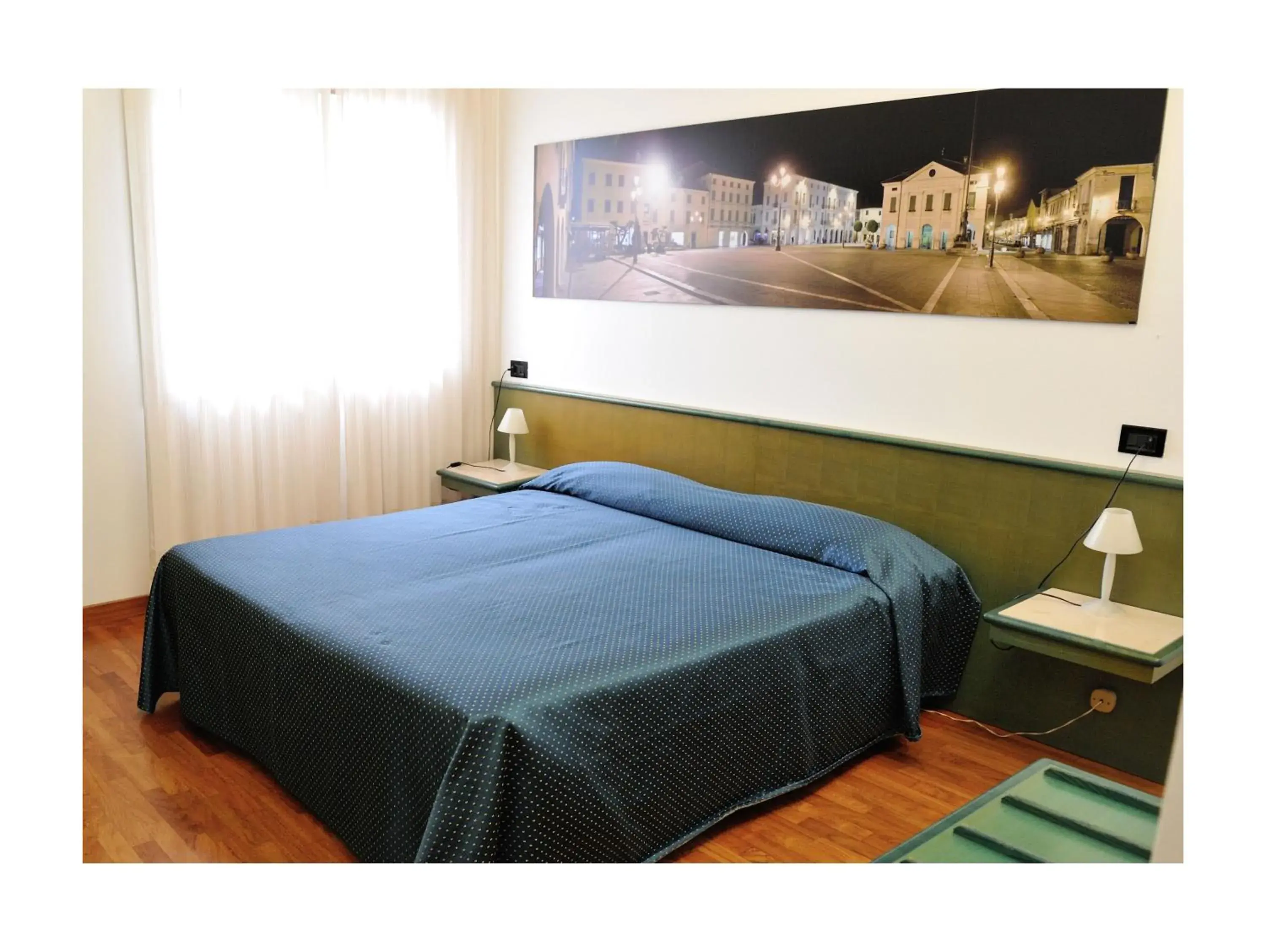 Bed in Rometta Hotel