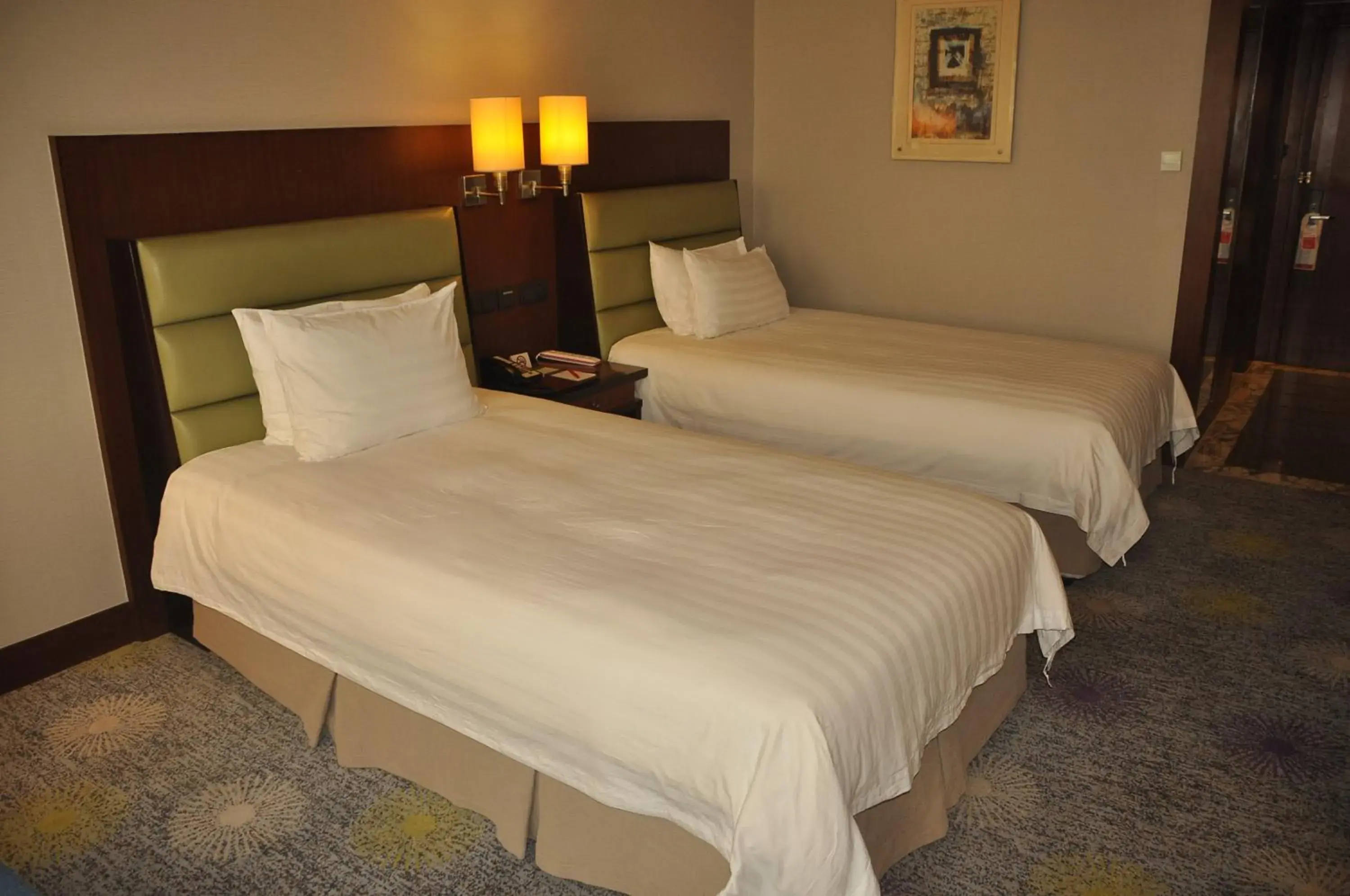 Bed in Ramada Plaza Hotel Pudong