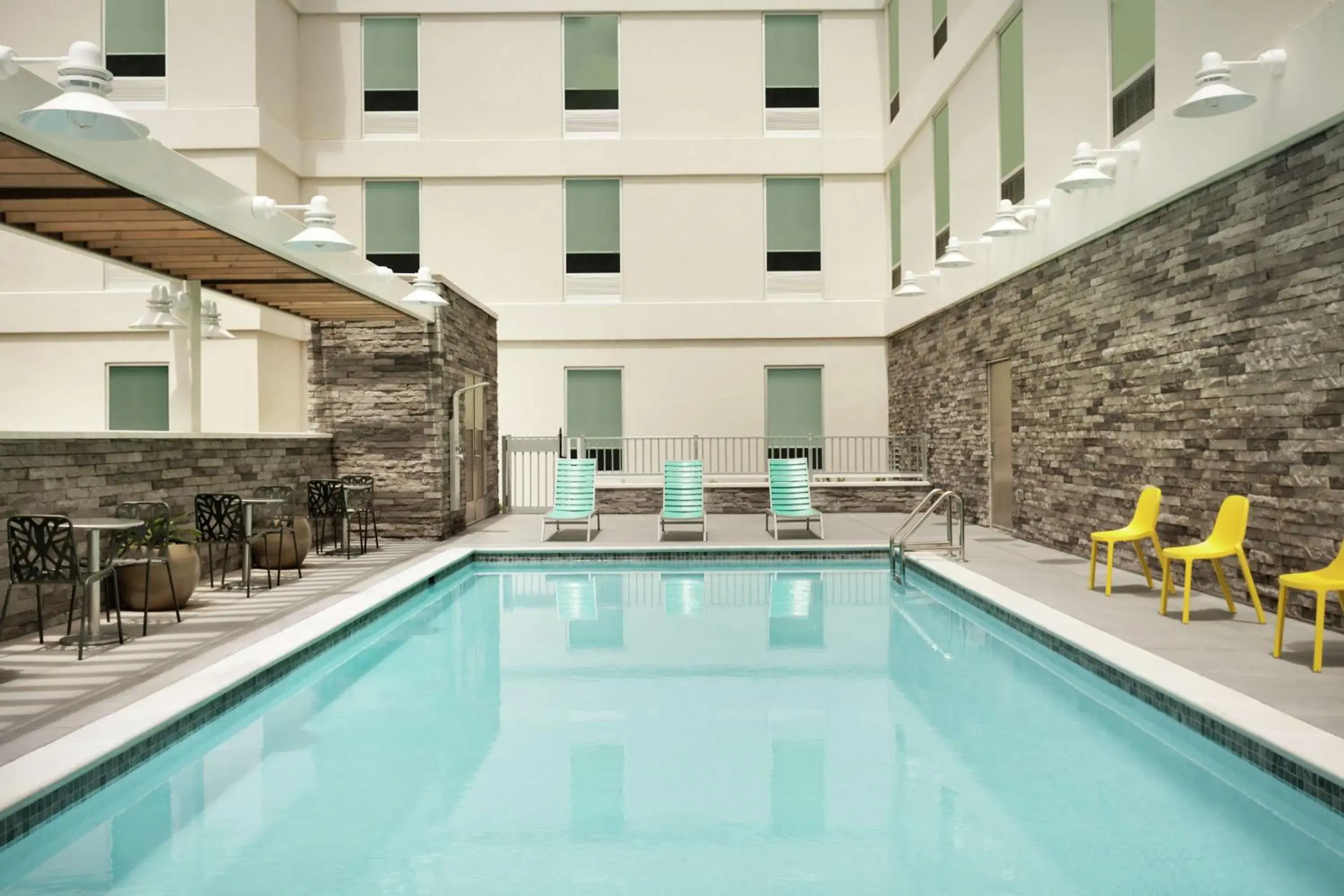 Pool view, Swimming Pool in Home2 Suites by Hilton Sarasota - Bradenton Airport, FL
