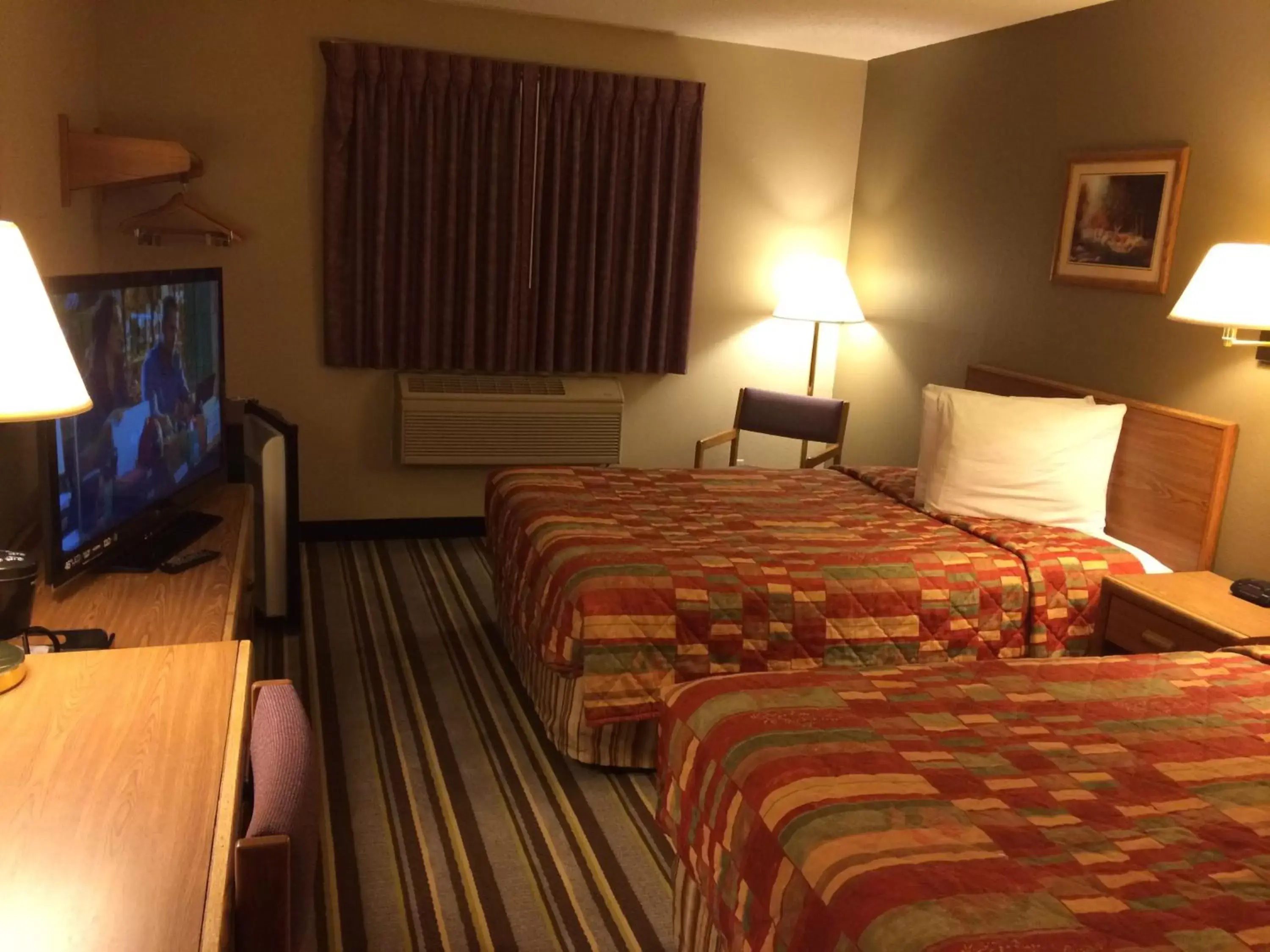 Bed in Super 8 by Wyndham Knoxville