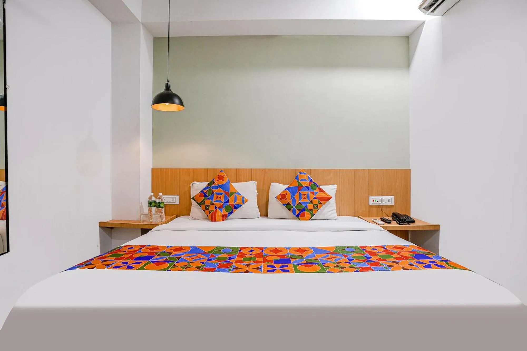 Bed in FabHotel Saarthi Inn