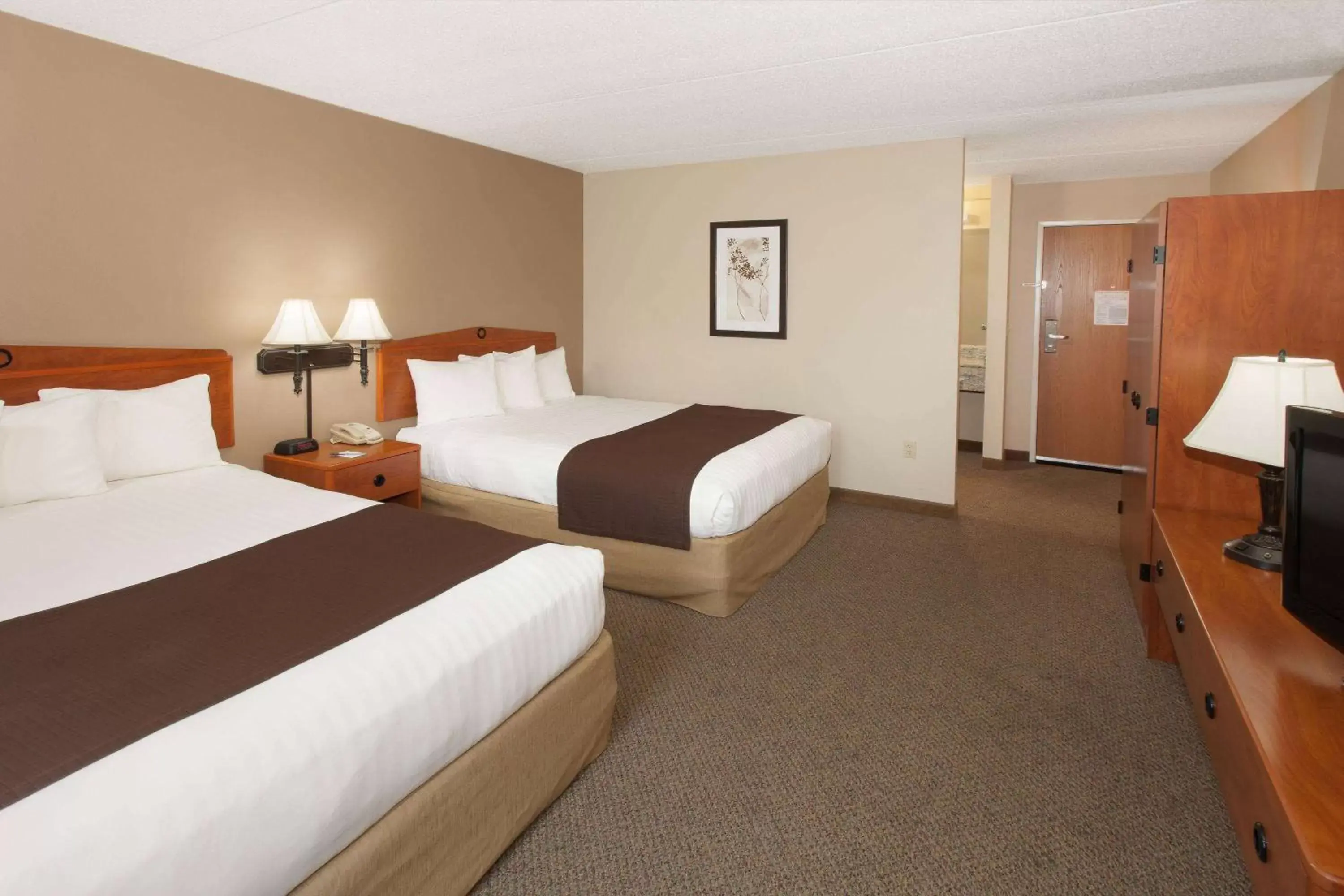 Photo of the whole room, Bed in AmericInn by Wyndham Greenville