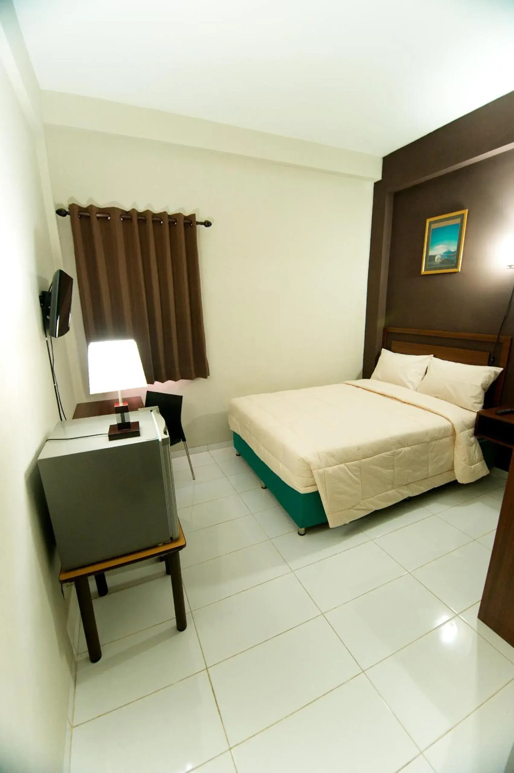 Photo of the whole room, Bed in Grace Setia Hotel