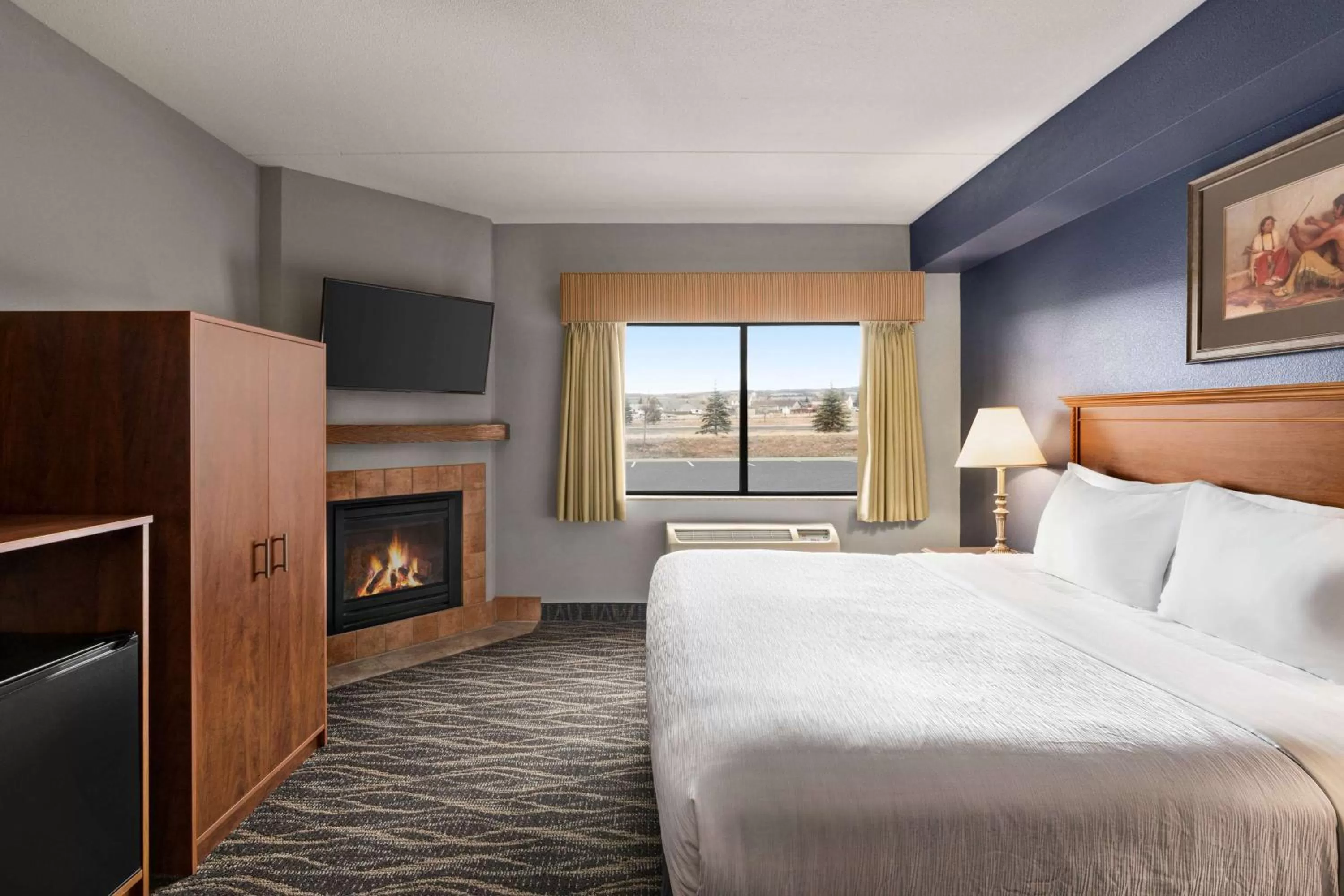 Photo of the whole room, Bed in AmericInn by Wyndham Laramie Near University of Wyoming