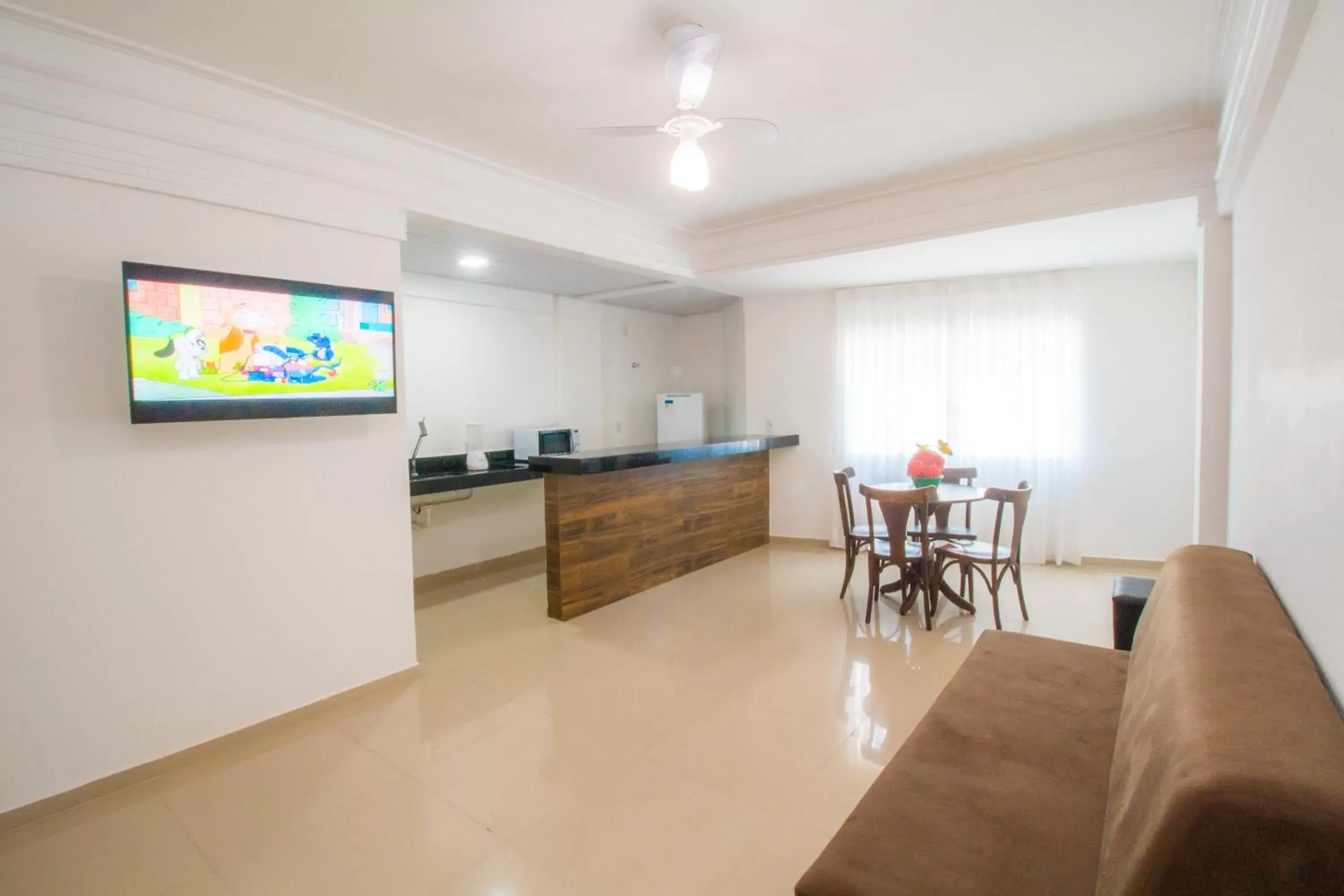 Communal lounge/ TV room in Portal Beach - Rede Soberano