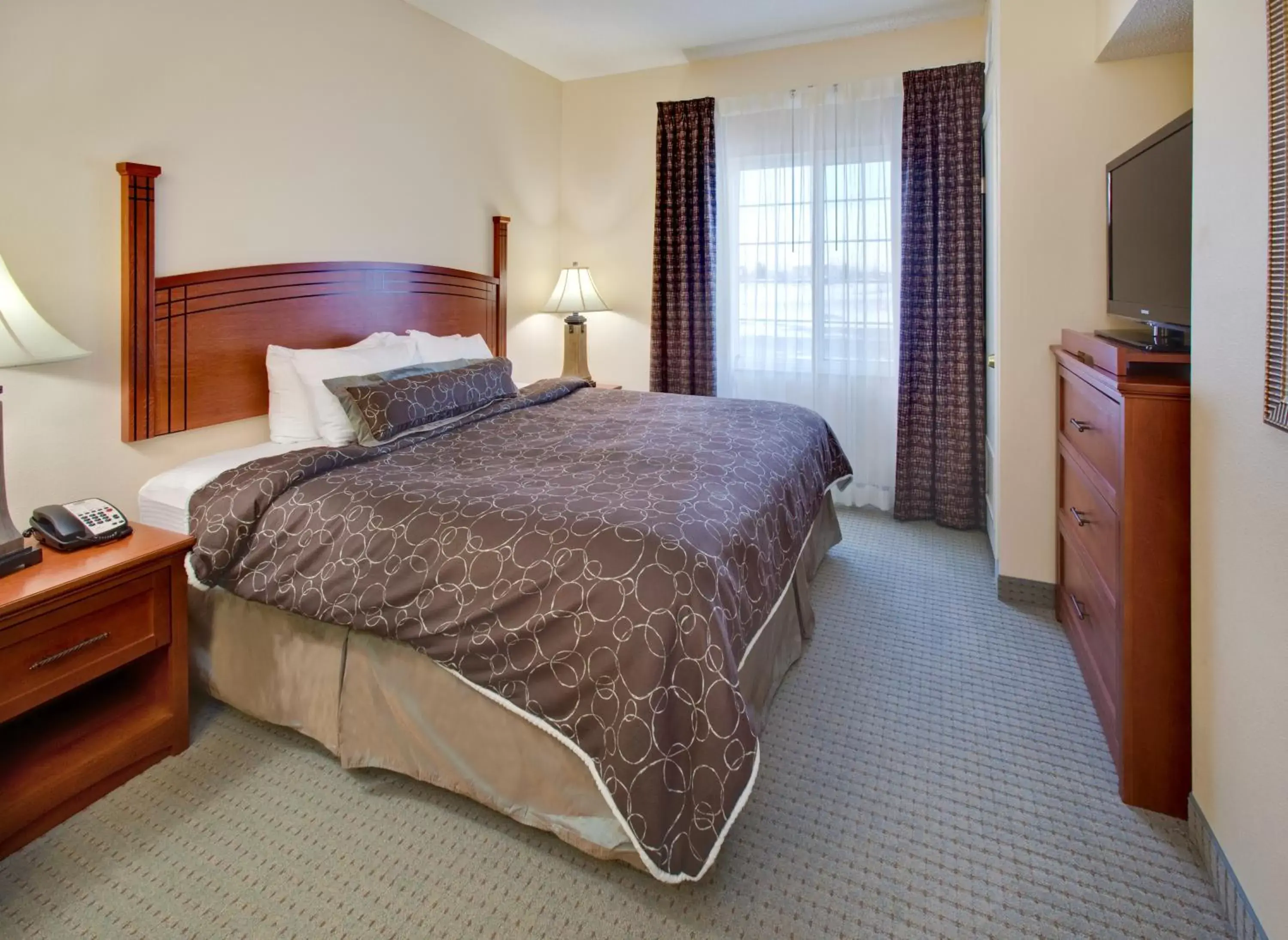 Bed in Staybridge Suites Fargo, an IHG Hotel