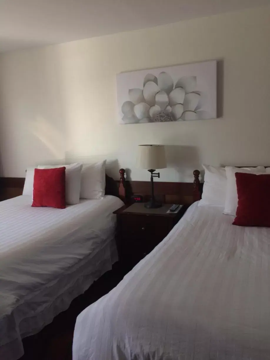 Bed in Atlantic Coast Inn Bed in Atlantic Coast Inn