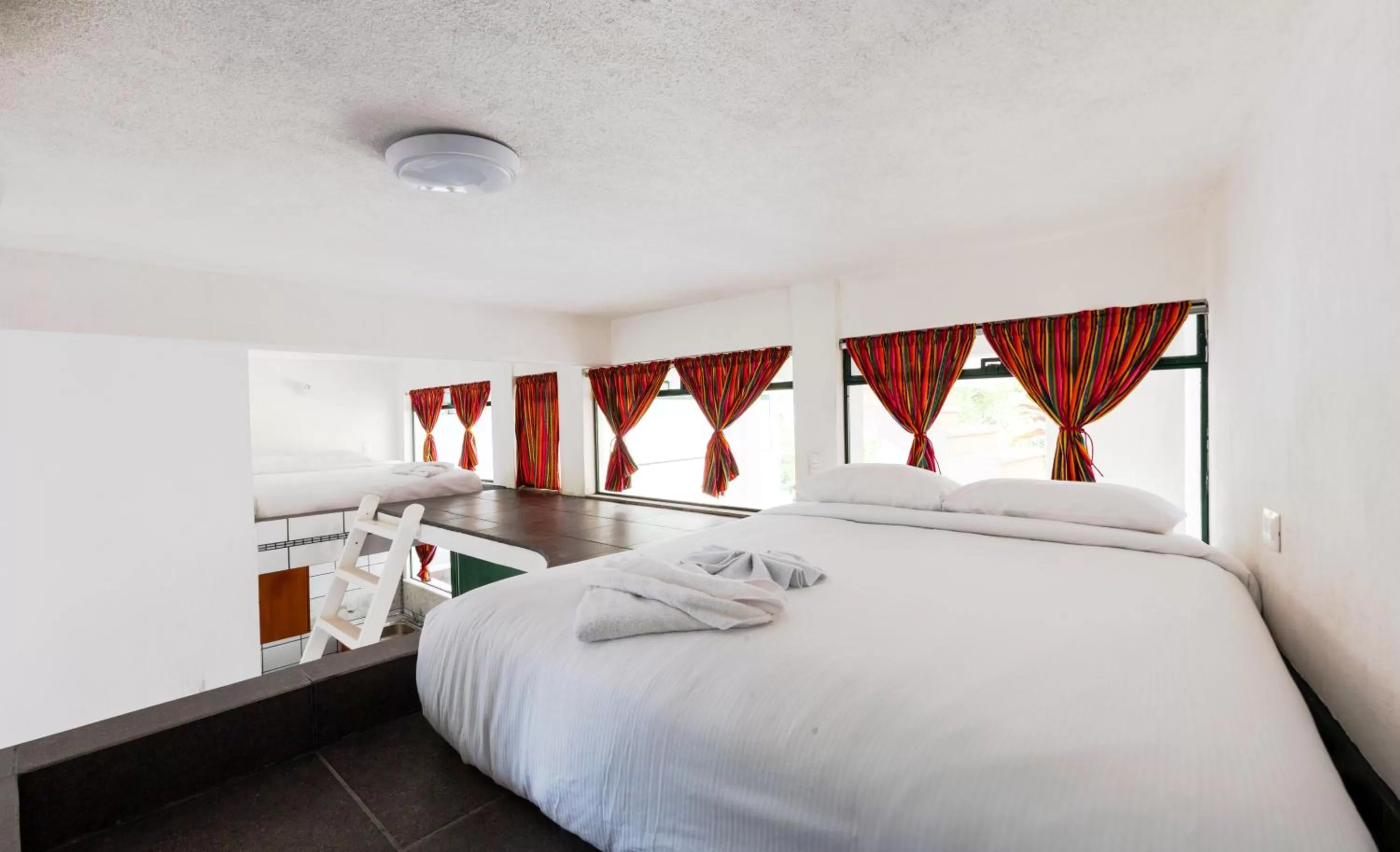 Bed in El Dragon Hotel