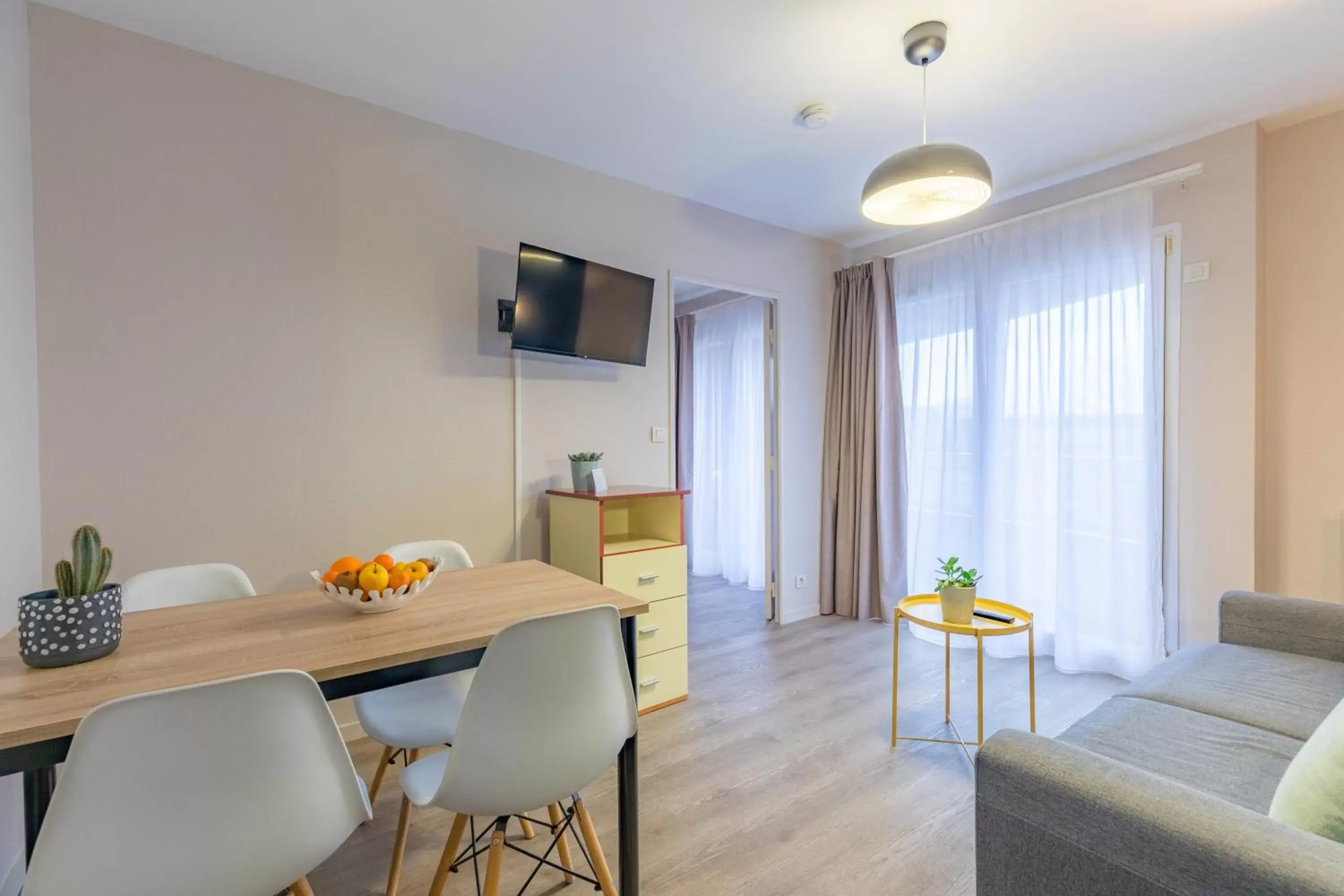 Living room, Dining Area in Appart'City Classic Caen