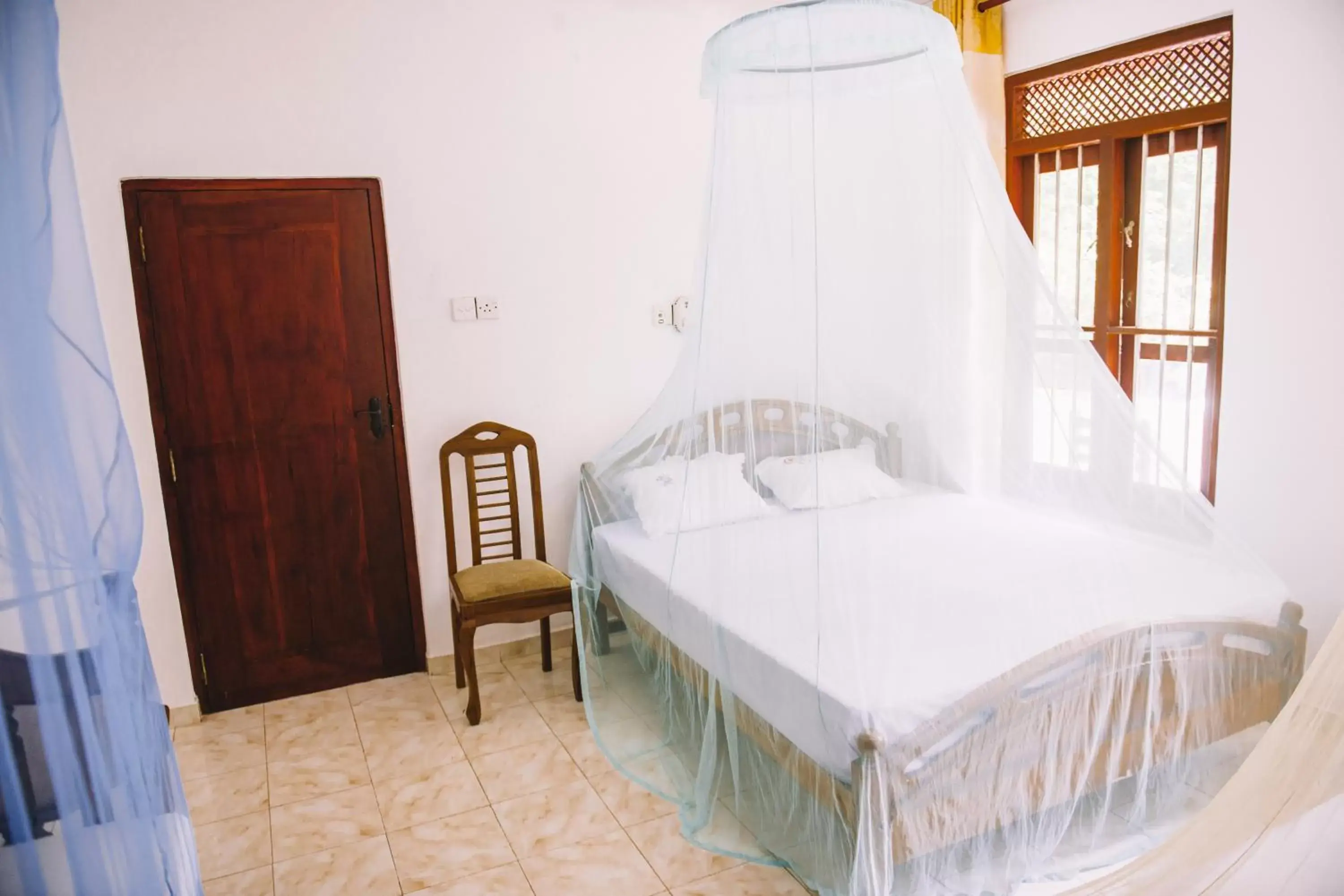 Standard Queen Room in Kadolana Guest House Standard Queen Room in Kadolana Guest House