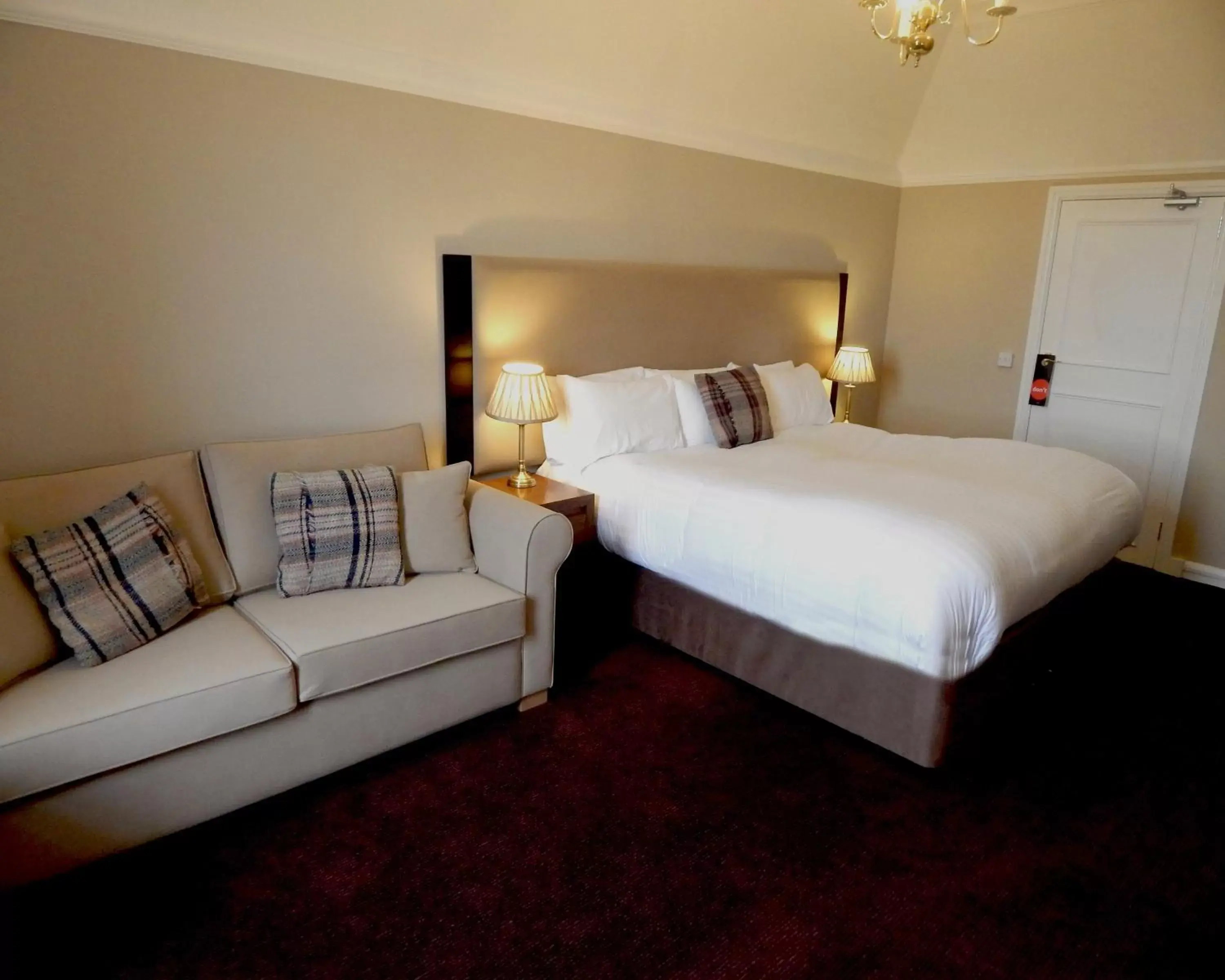 Seating area, Bed in Tulloch Castle Hotel ‘A Bespoke Hotel’