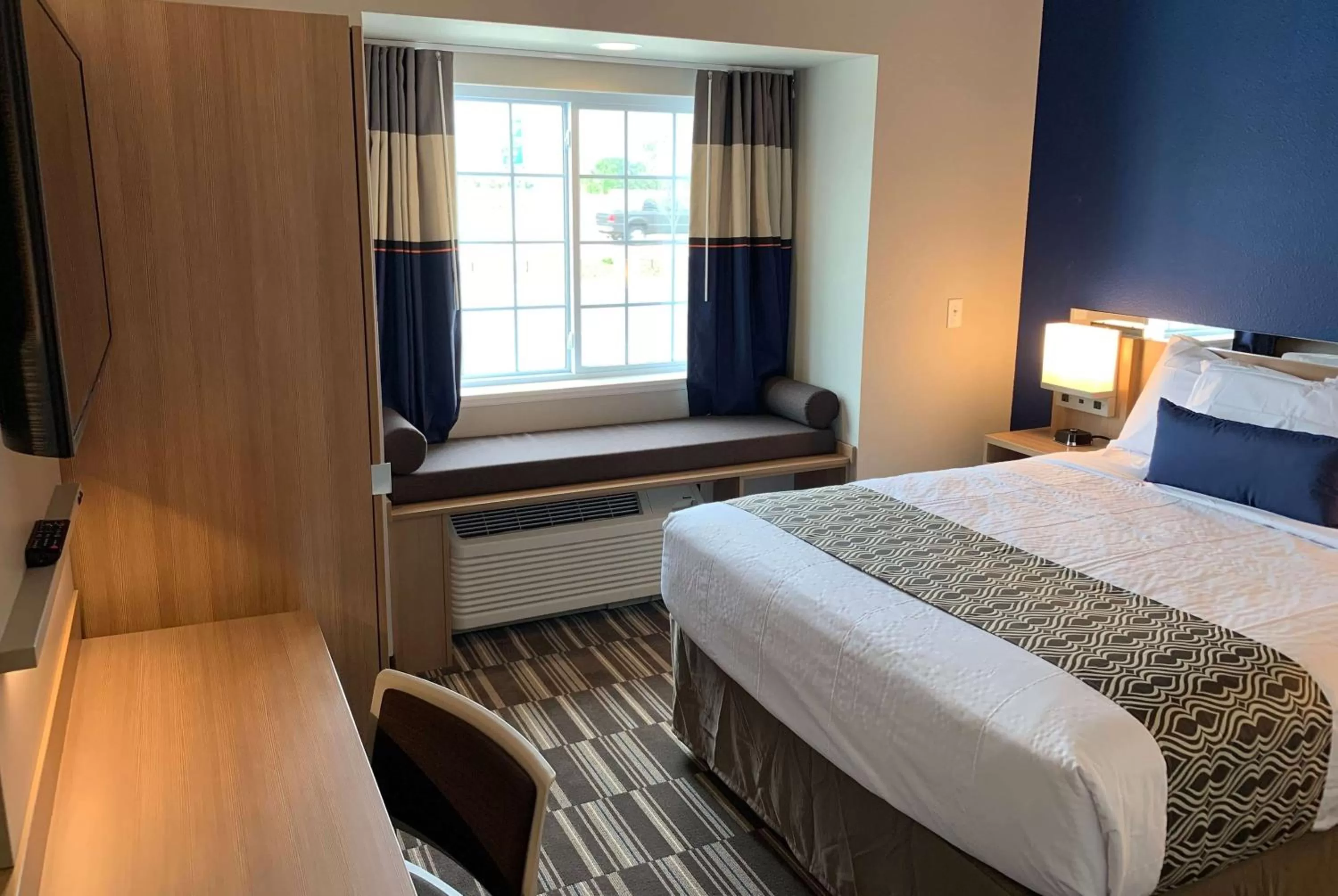 Photo of the whole room, Bed in Microtel Inn & Suites by Wyndham Fountain Fort Carson