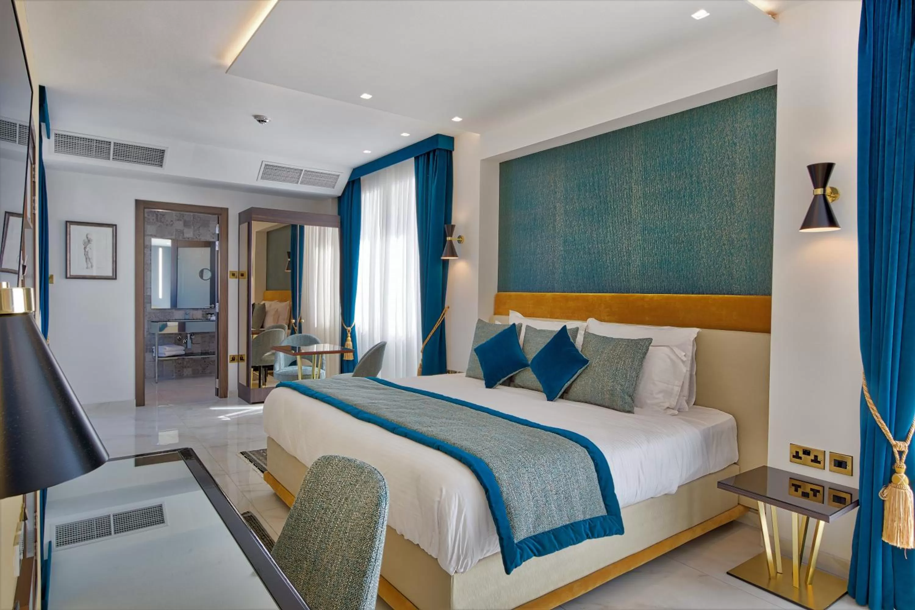 Bed in Palazzo Rosaria Boutique Hotel