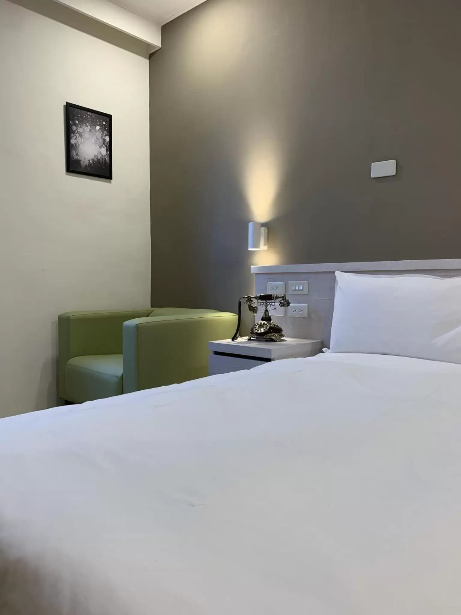 Bed in Raise Hotel Taichung