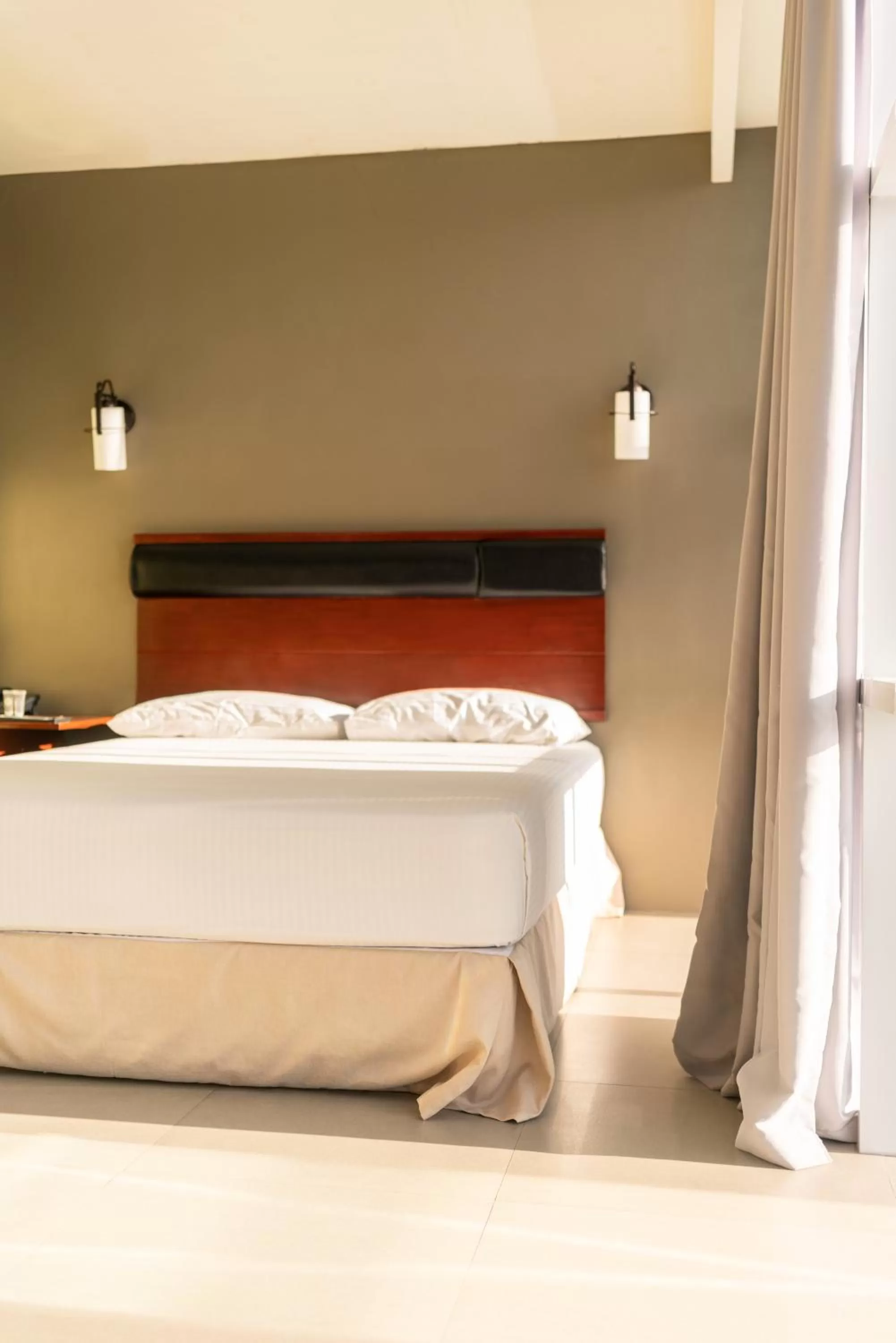 Property building, Bed in Dosi Hotel PH