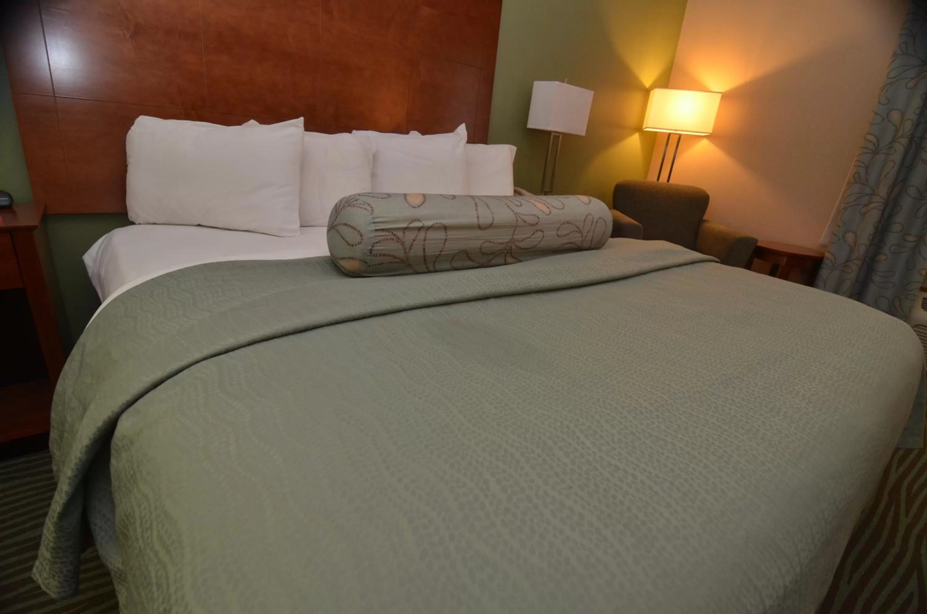 Bed in AmericInn by Wyndham Des Moines Airport