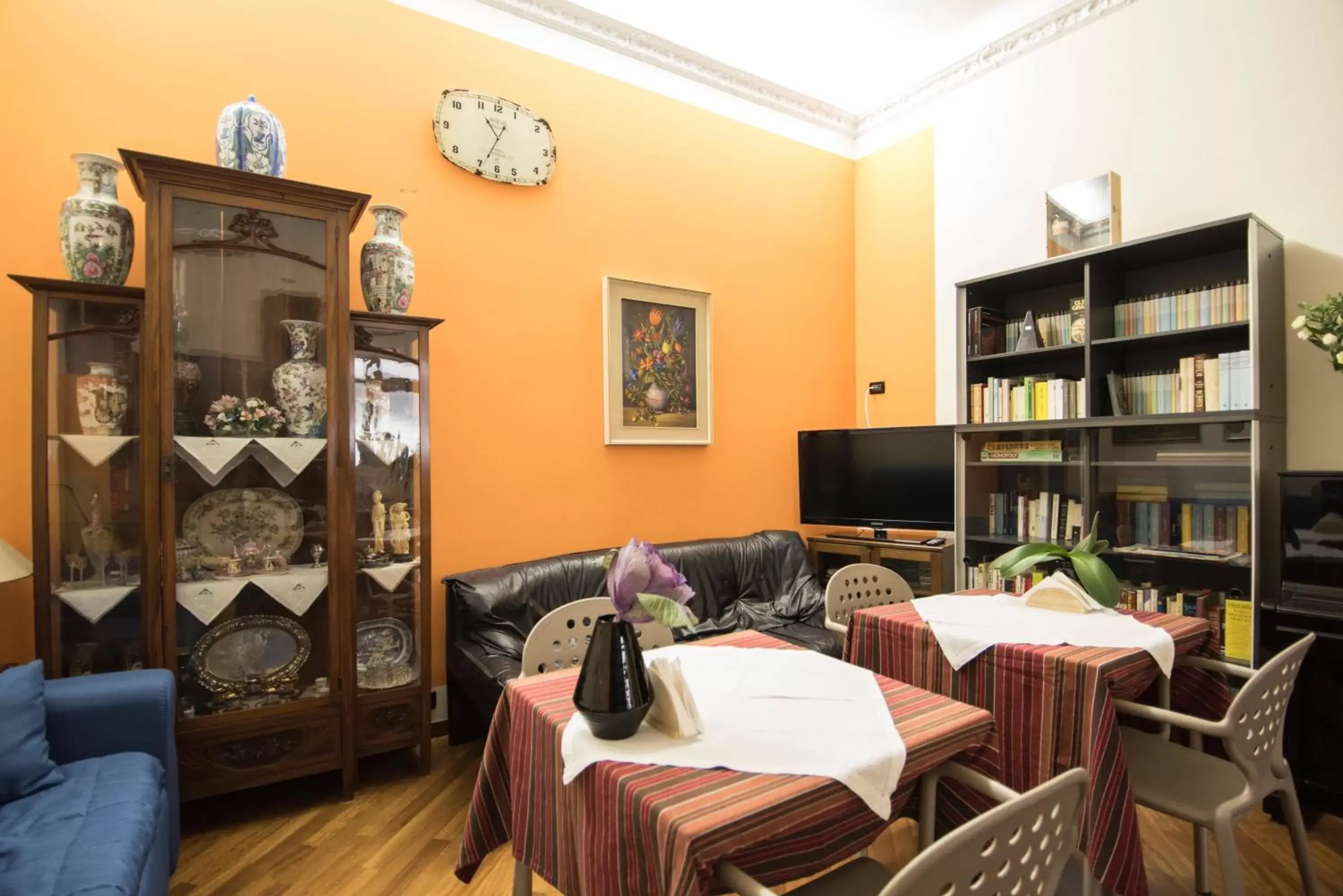 Communal lounge/ TV room in B&B Via Roma
