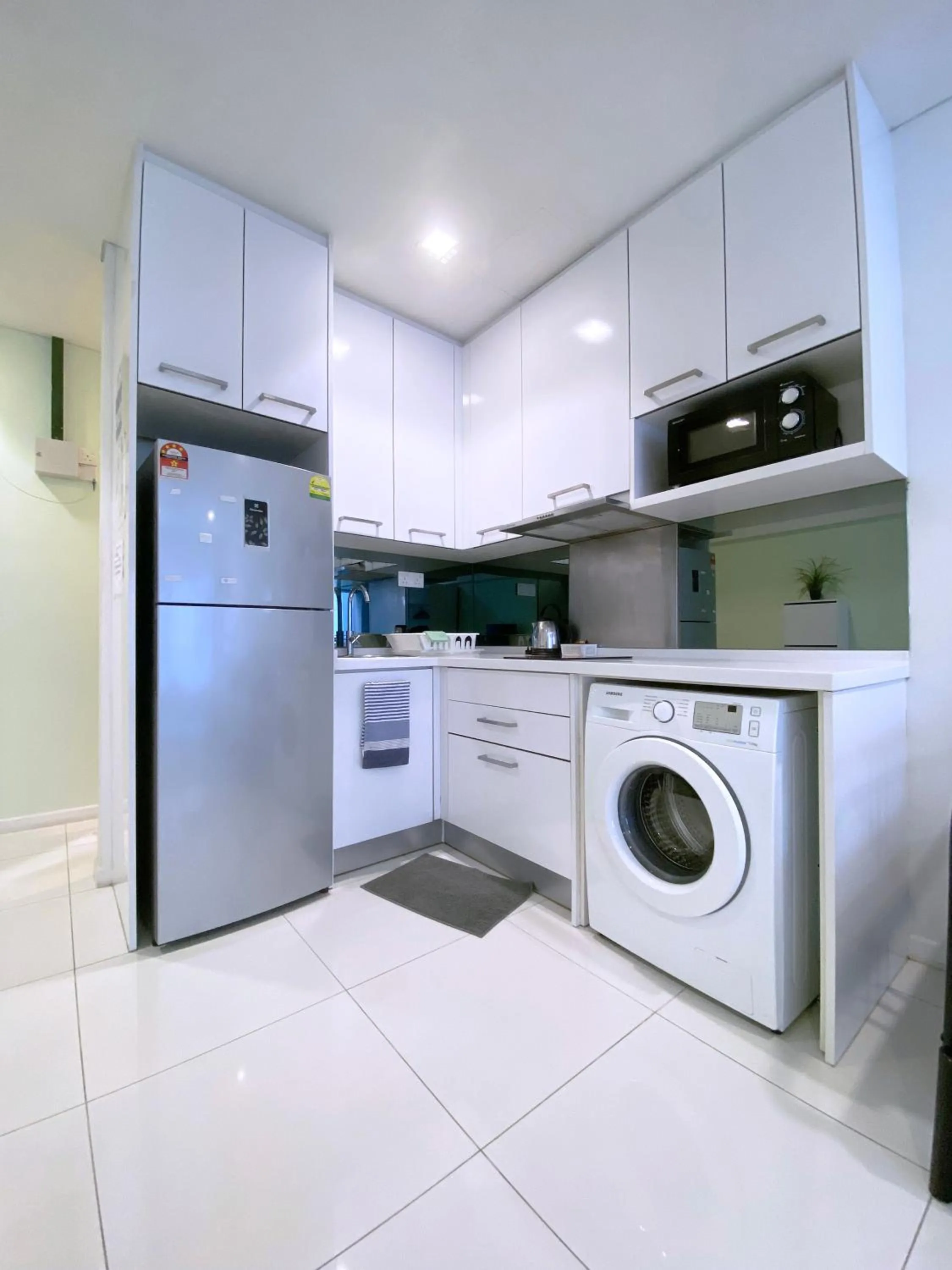 Kitchen/Kitchenette in Mercu Summer Suite KLCC @ Penguin Homes