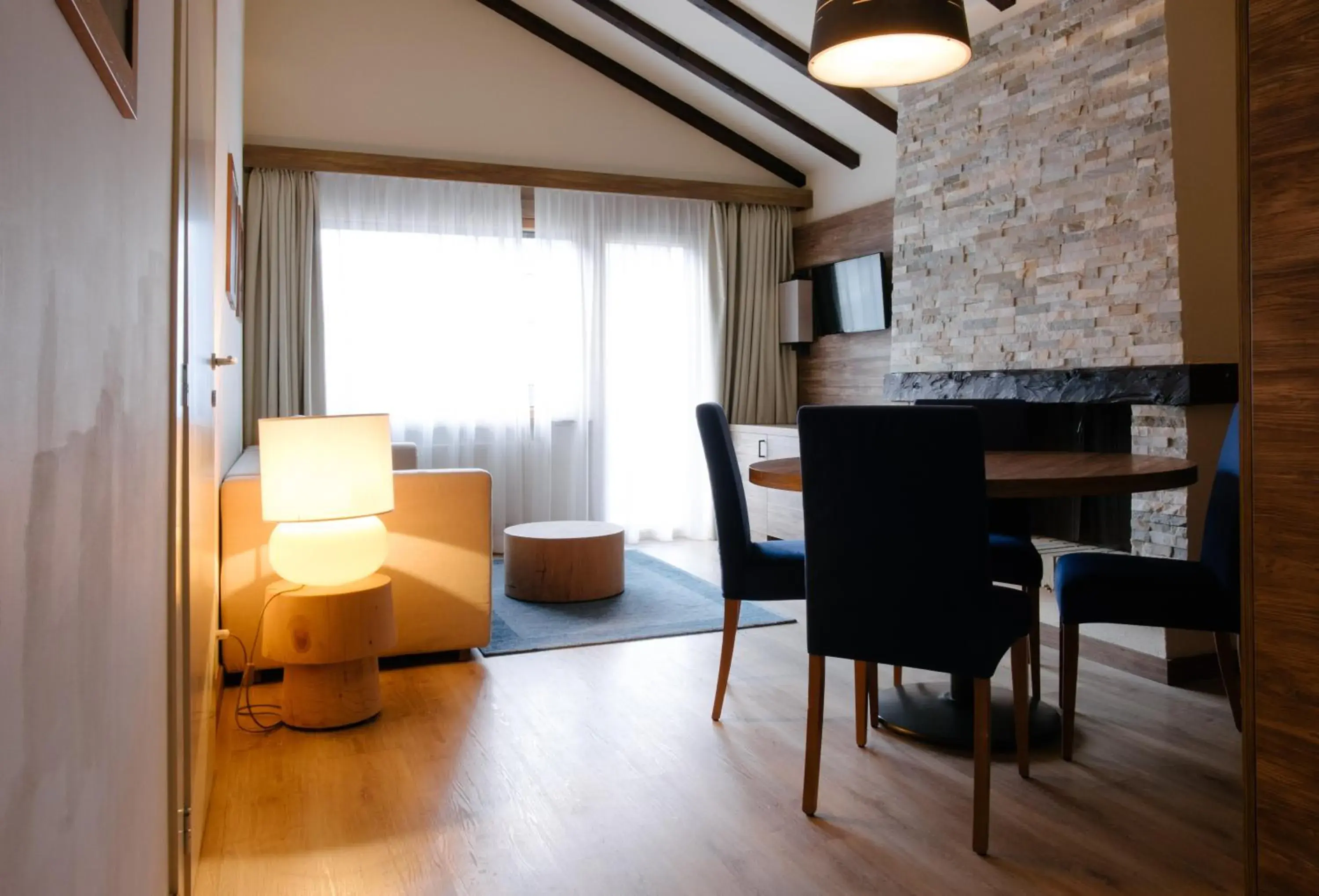 Living room, Dining Area in Hotel Ambassador Zermatt