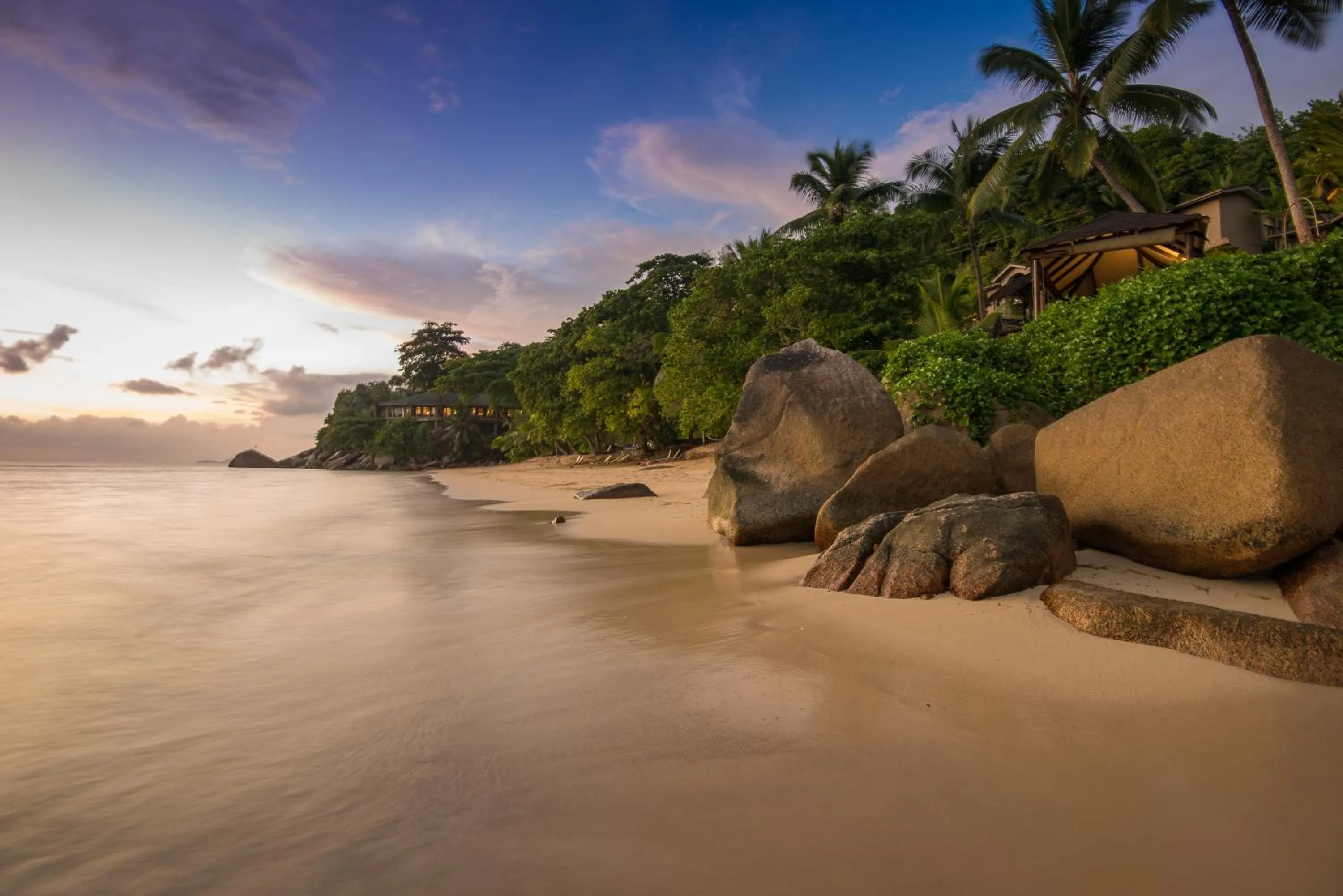 Beach in Coco de Mer Hotel and Black Parrot Suites