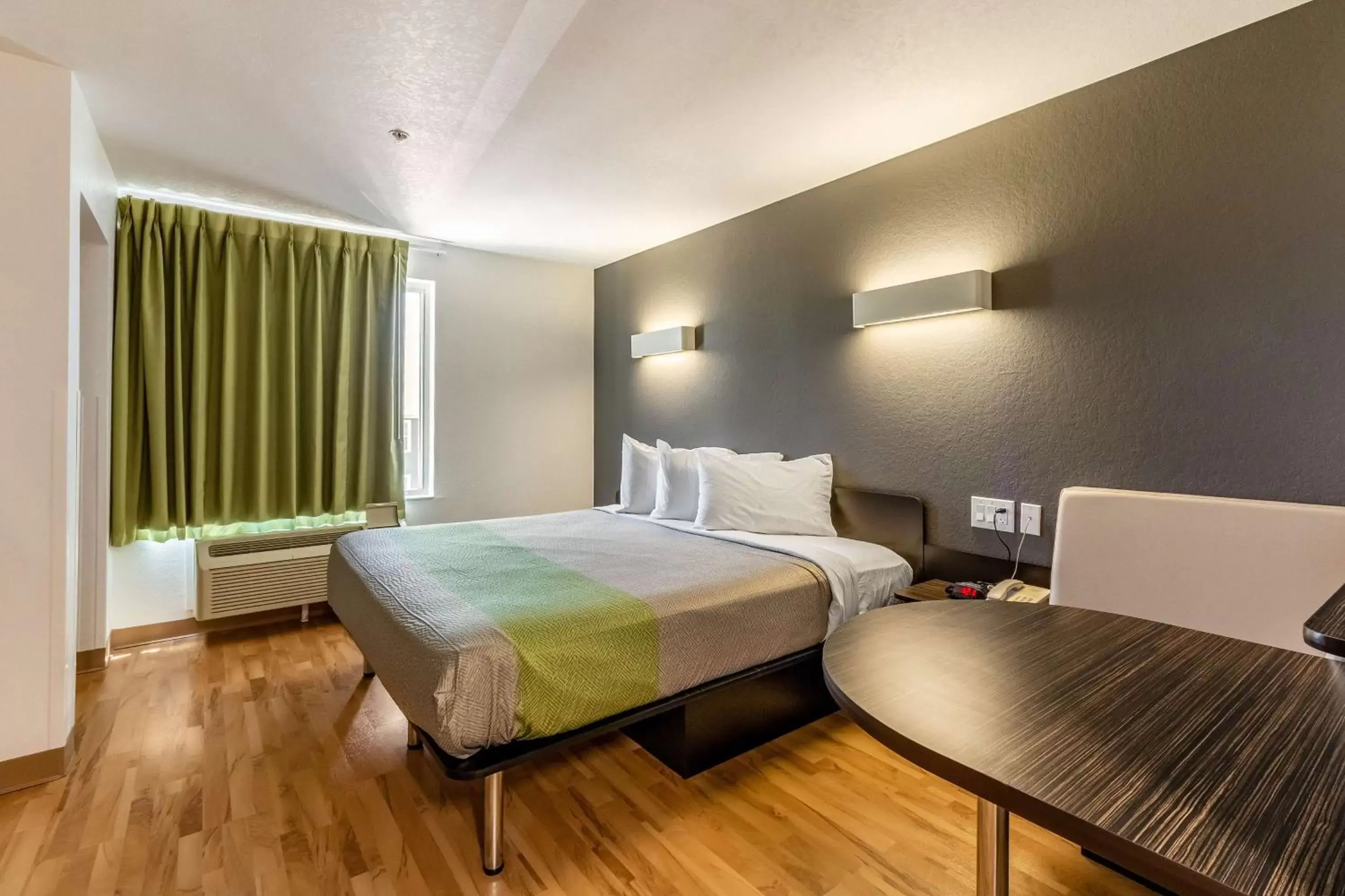 Seating area, Bed in Studio 6-San Marcos, TX Seating area, Bed in Studio 6-San Marcos, TX