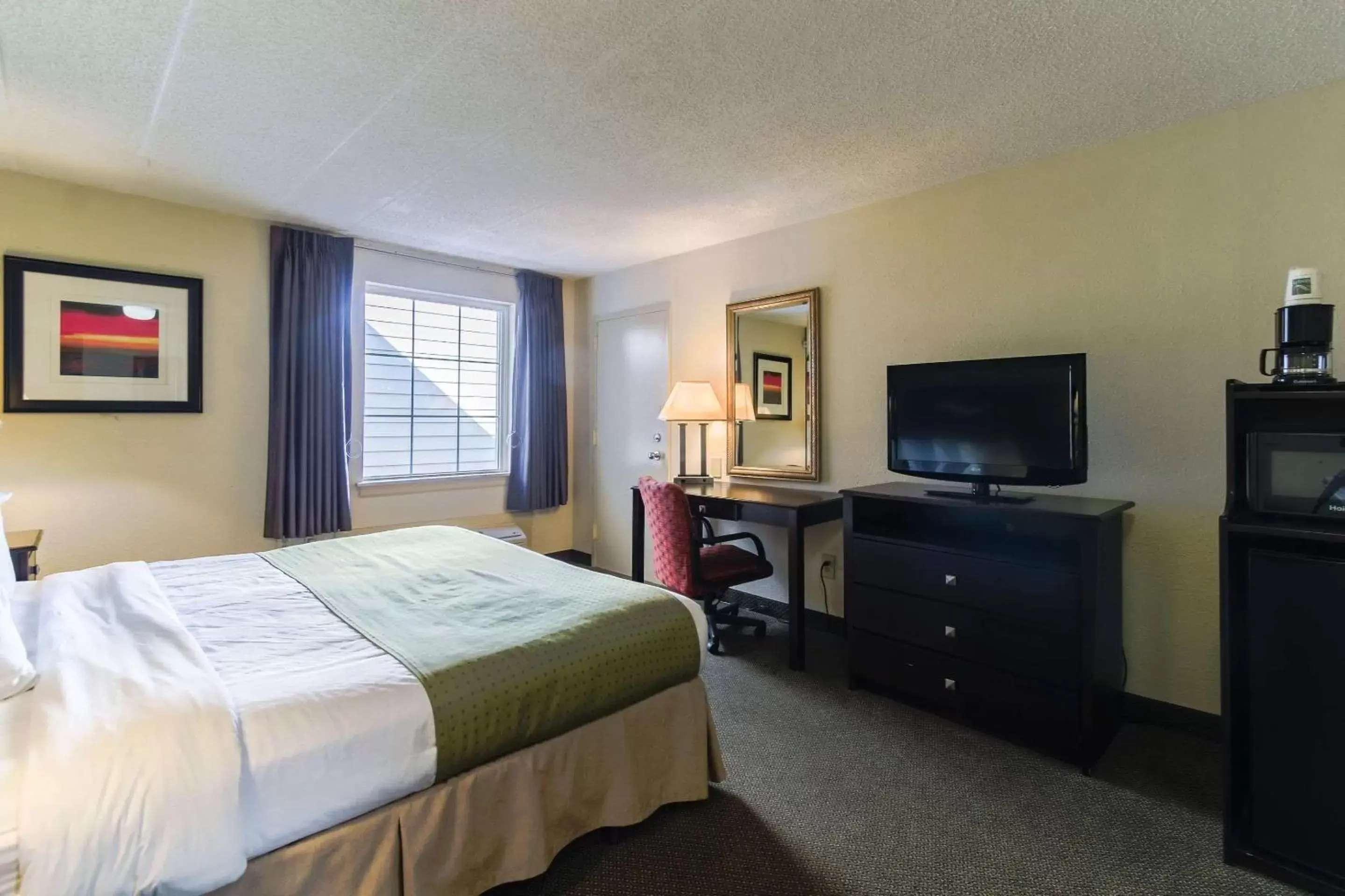 Photo of the whole room, TV/Entertainment Center in Quality Inn & Suites Conference Center West Chester