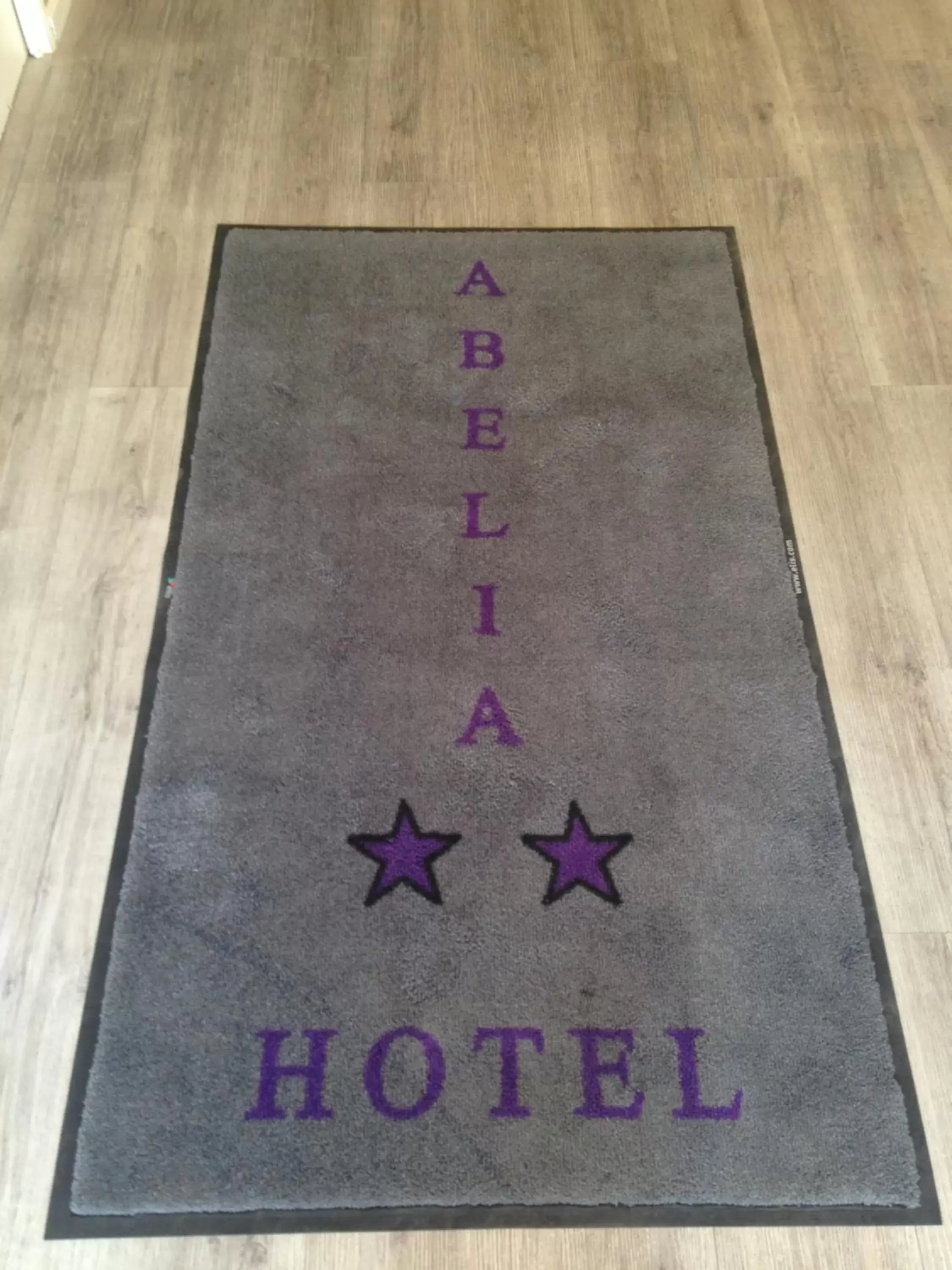 Property logo or sign in Hotel Abelia