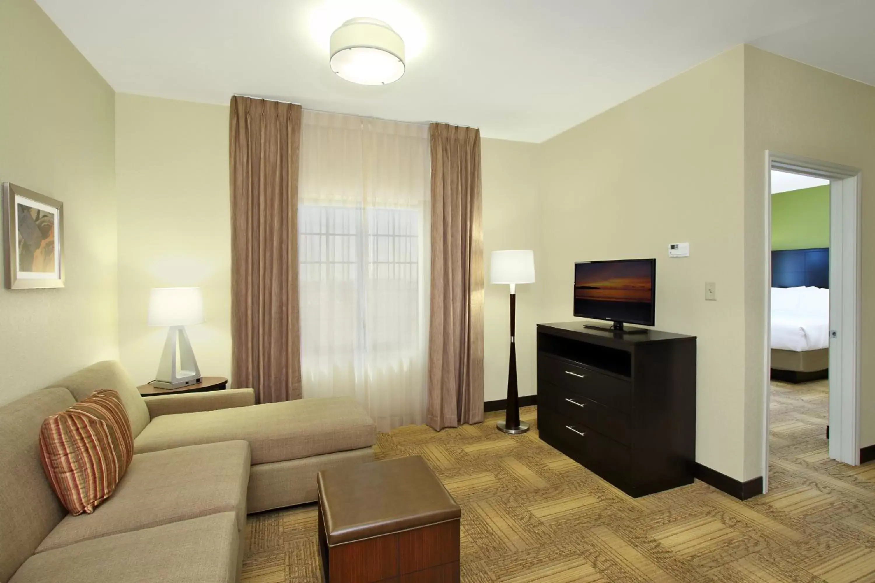 Bedroom, Seating Area in Staybridge Suites - Odessa - Interstate HWY 20, an IHG Hotel