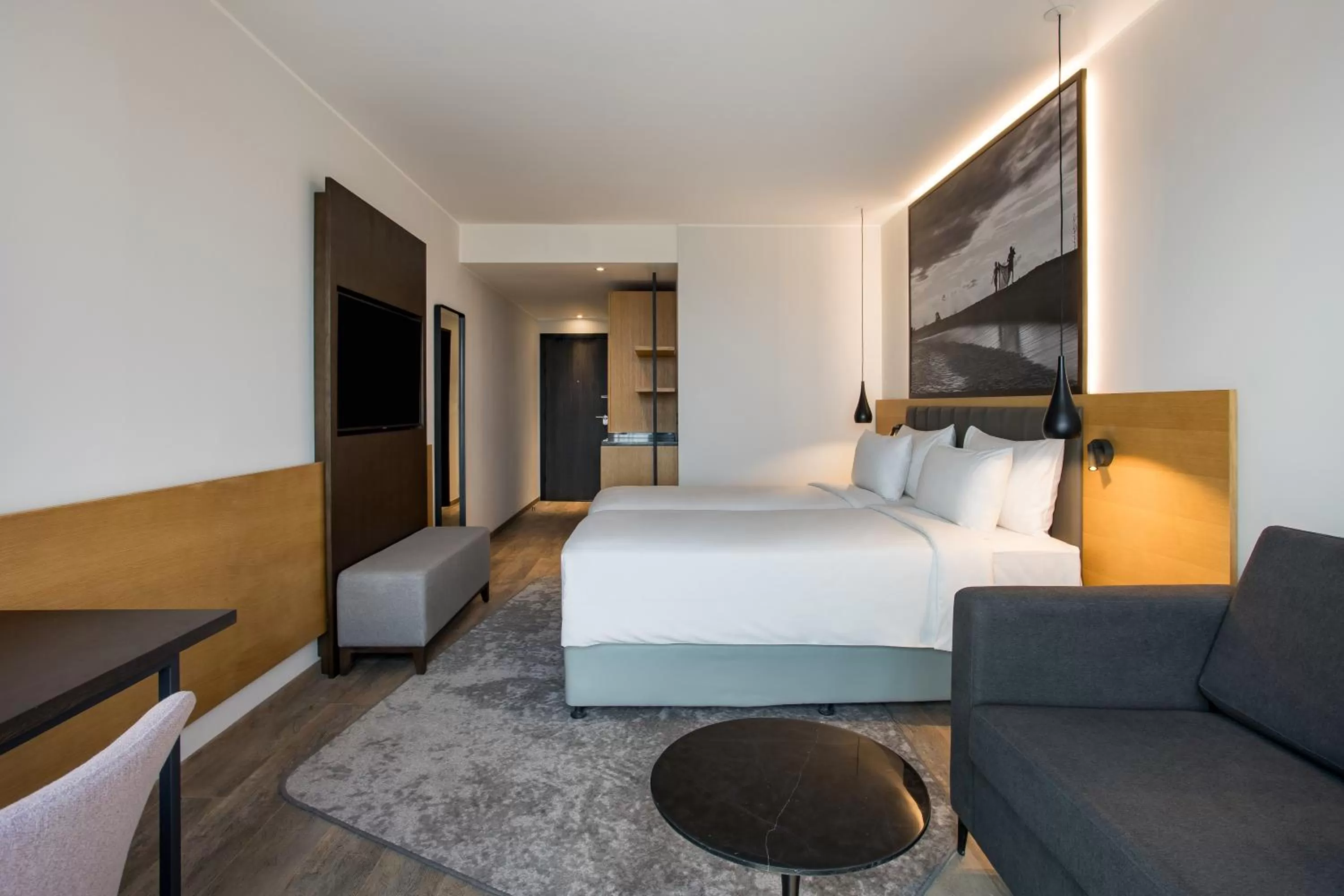 Photo of the whole room, Bed in Radisson Blu Hotel Antananarivo Waterfront