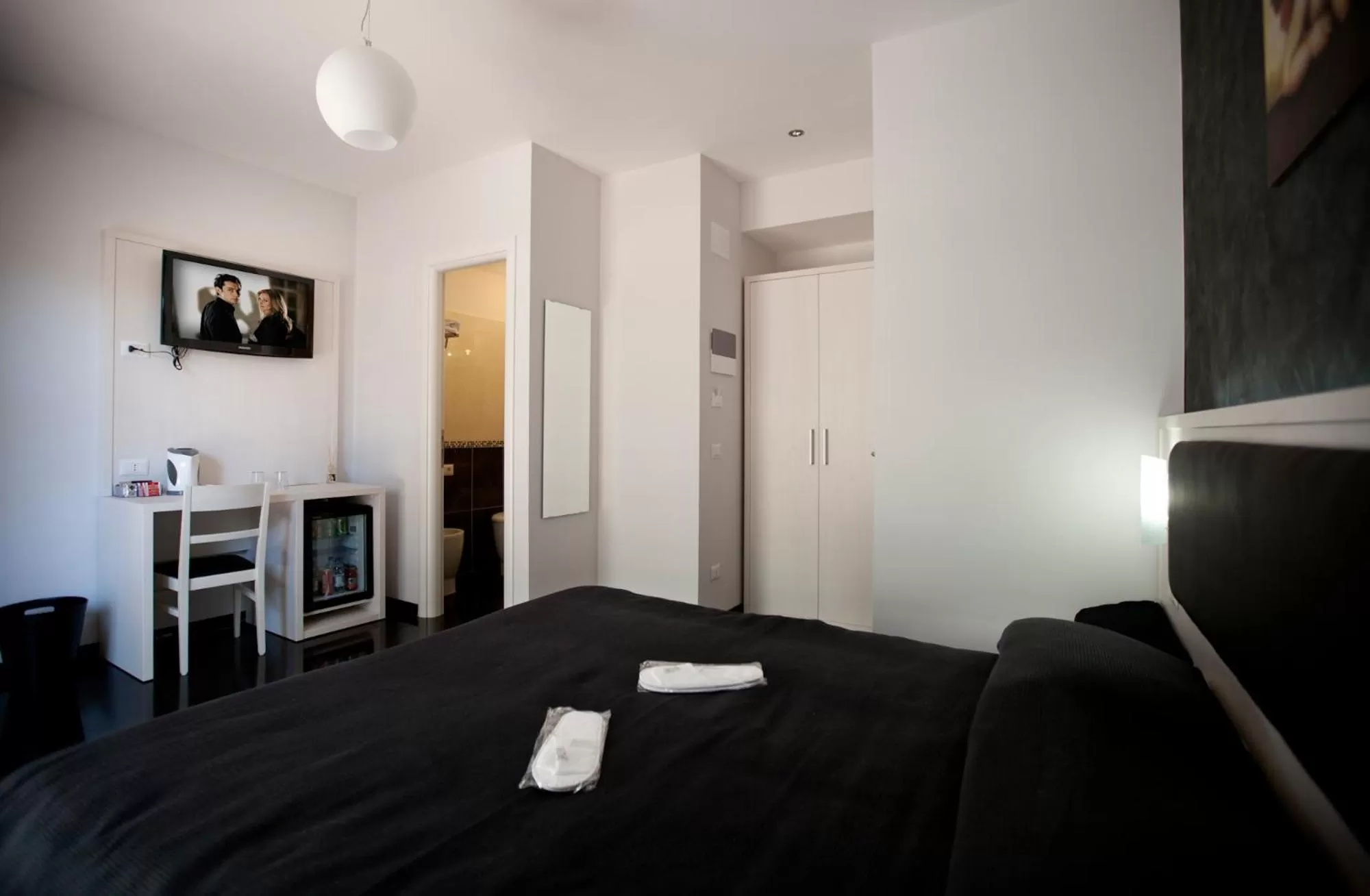 Decorative detail, Bed in Heart of Rome Rooms