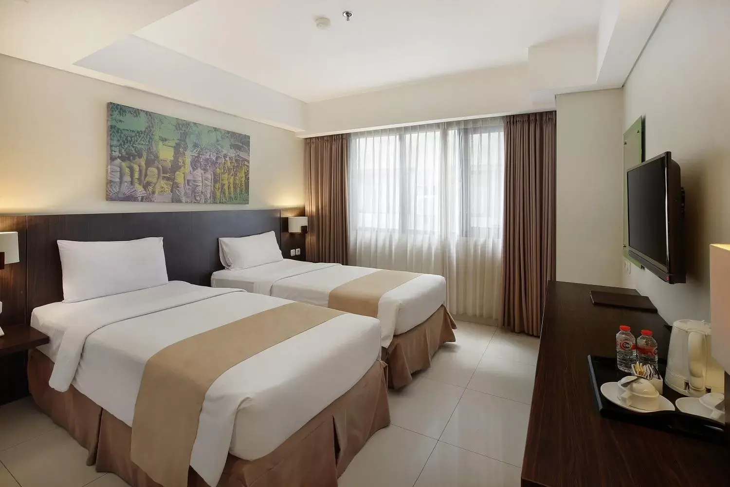 Bed in Rofa Kuta Hotel - CHSE Certified