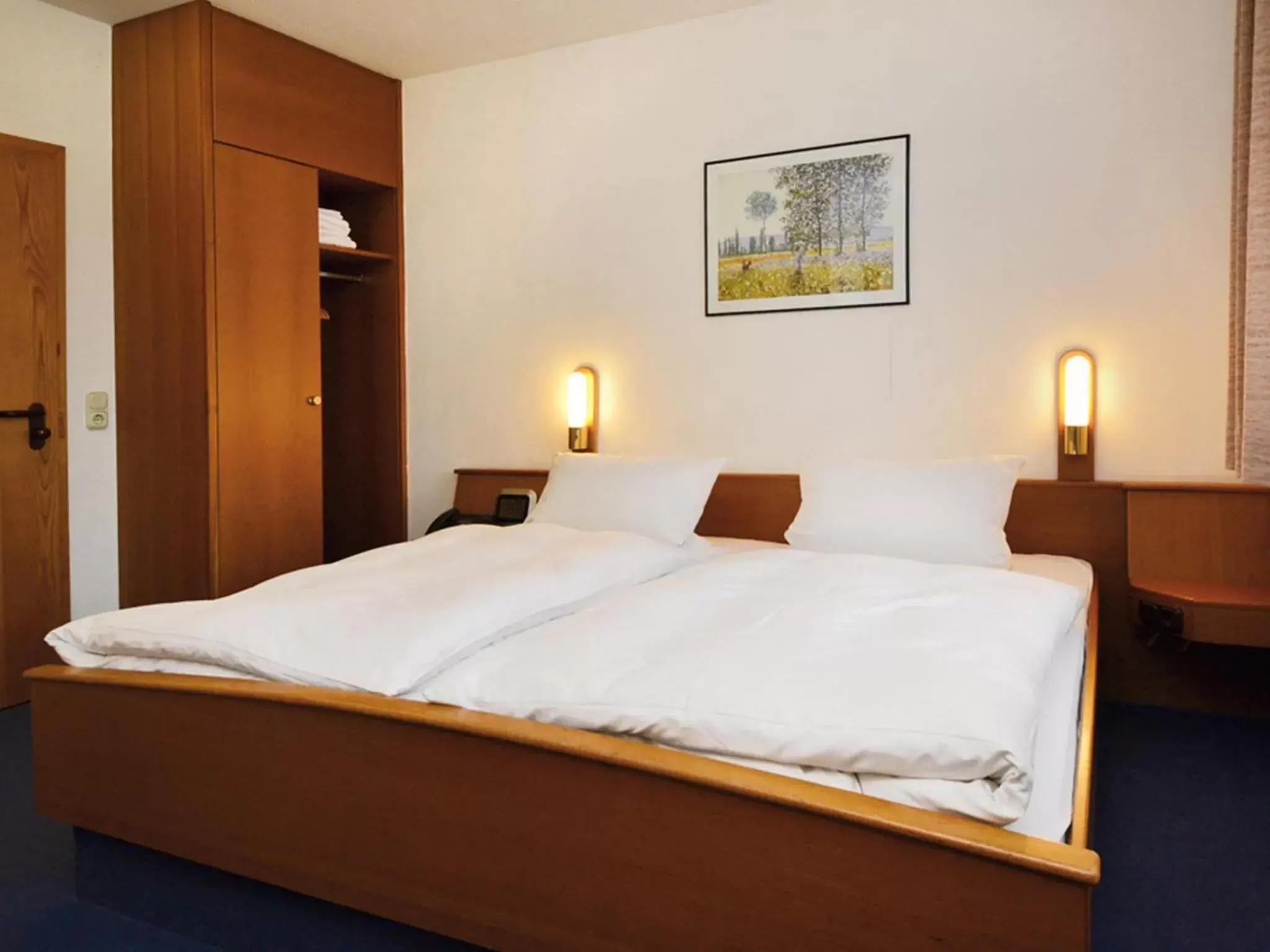 Small Economy Double or Twin Room in Seligweiler Hotel & Restaurant Small Economy Double or Twin Room in Seligweiler Hotel & Restaurant