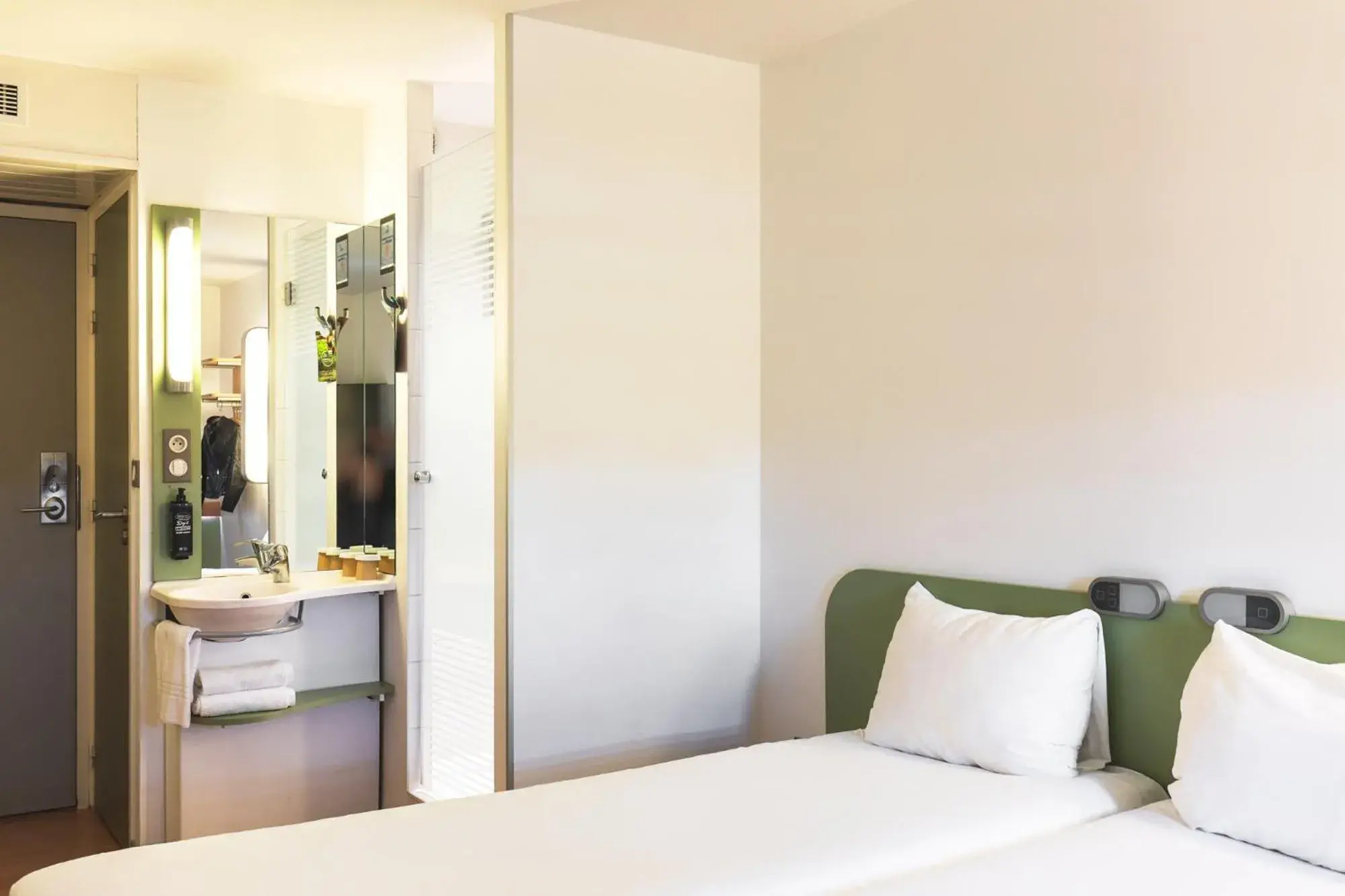 Bathroom, Bed in ibis budget Lyon Confluence