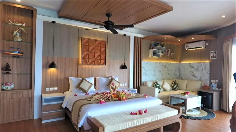 Bed in SUITE OCEAN BLUE