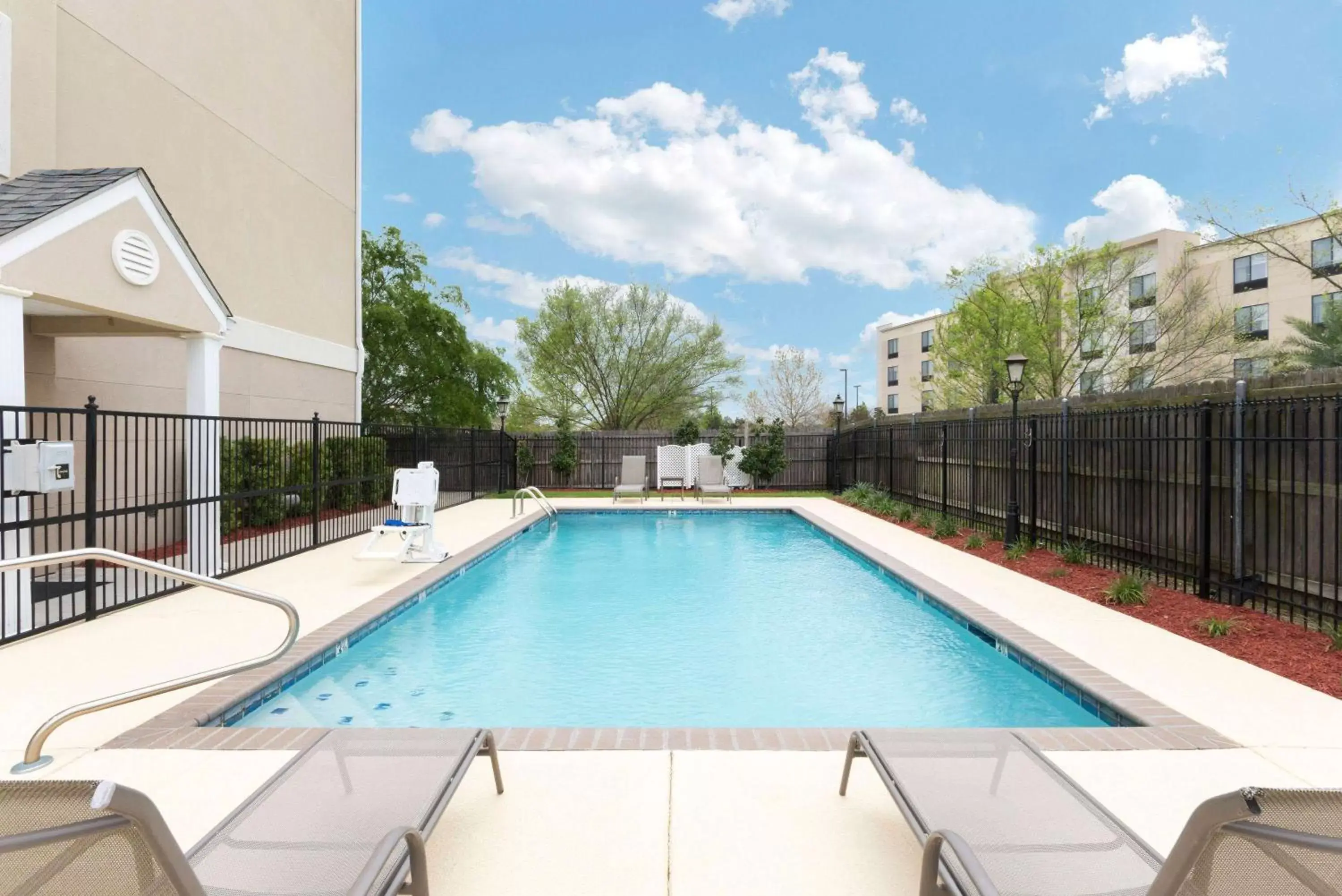 Pool view, Swimming Pool in Microtel Inn and Suites Baton Rouge Airport