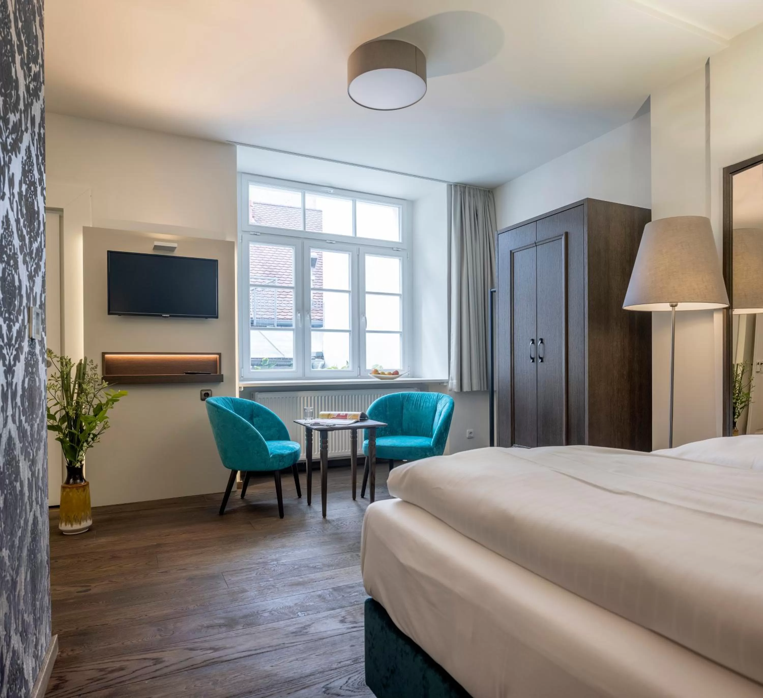 TV and multimedia, Bed in Altstadthotel der Patrizier