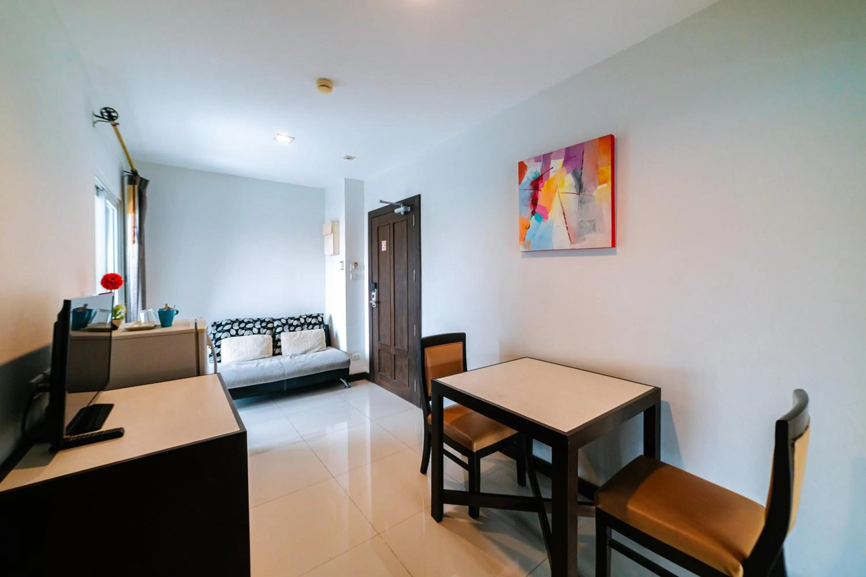 Living room, Bed in Ratana Hotel Sakdidet, PHUKET TOWN