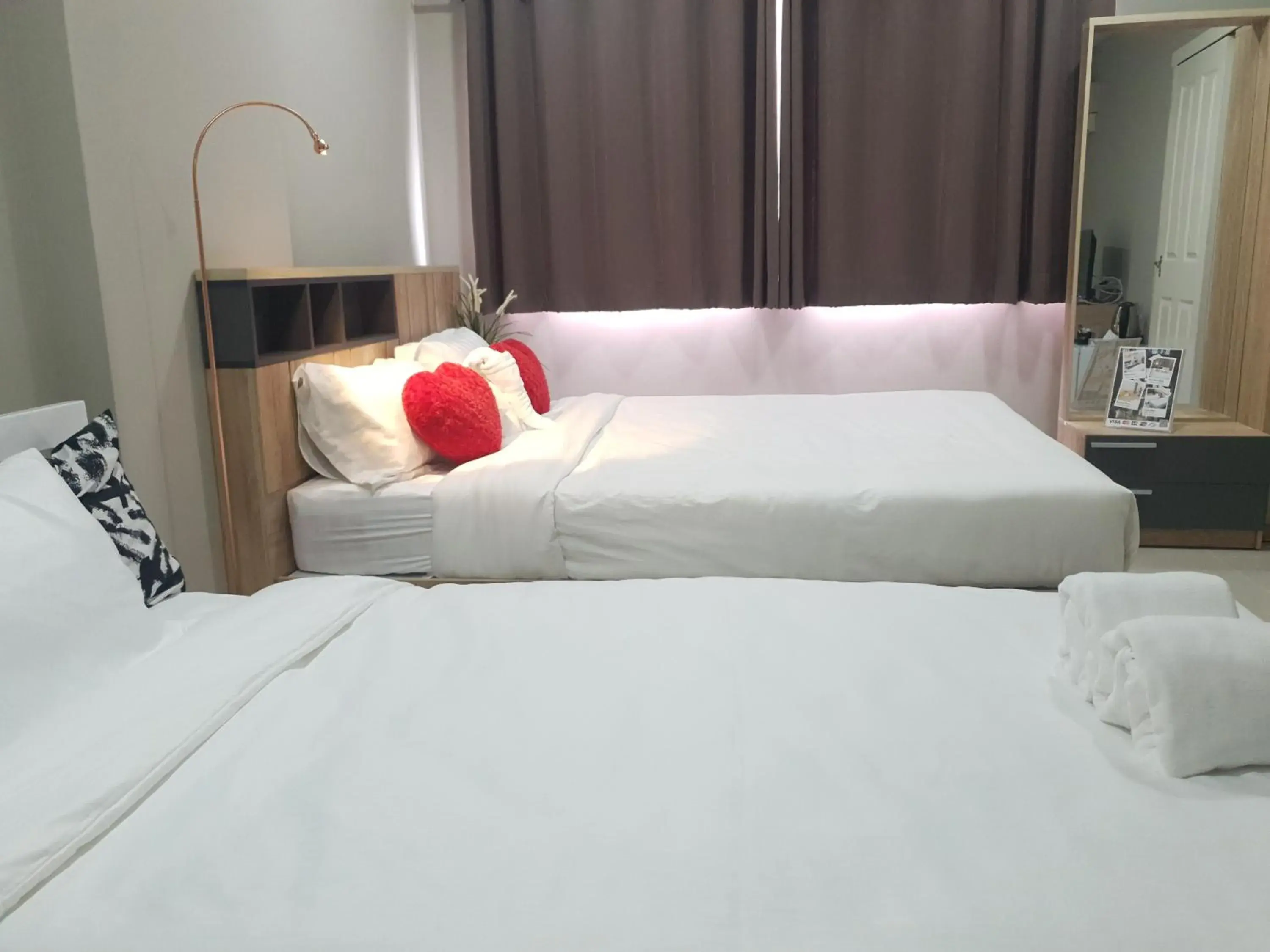 Communal lounge/ TV room, Bed in iResidence Hotel Pathumthani