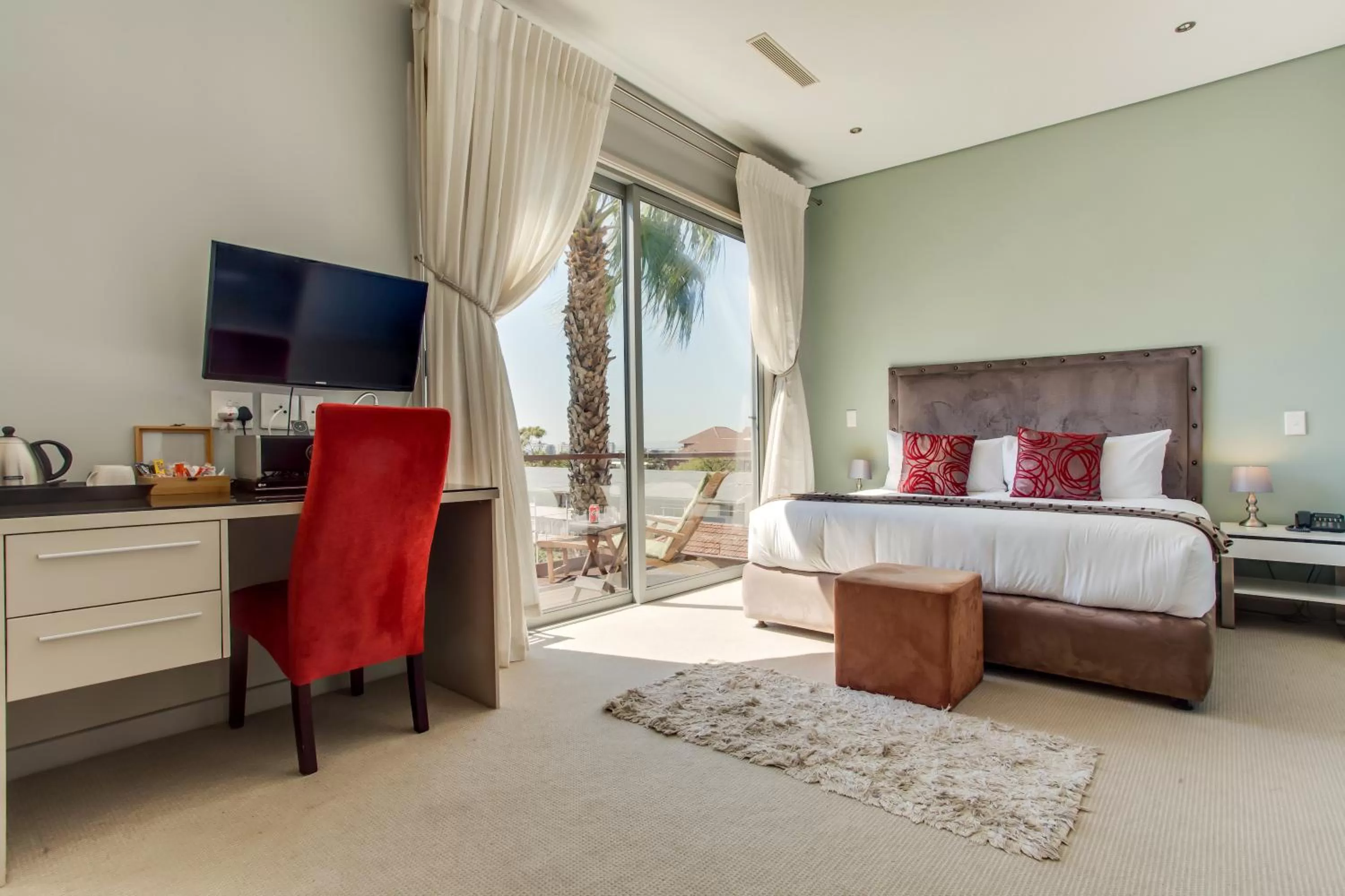 Photo of the whole room, Bed in The One 8 Hotel in Green Point - Solar Power