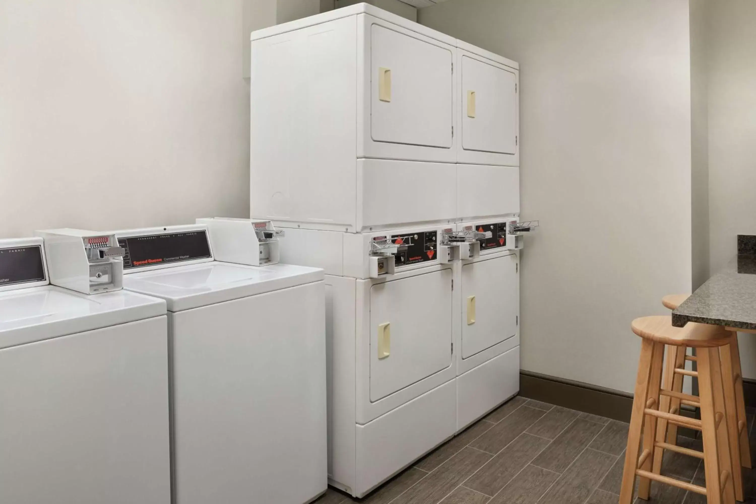 Property building, Kitchen/Kitchenette in Homewood Suites Rochester-Henrietta