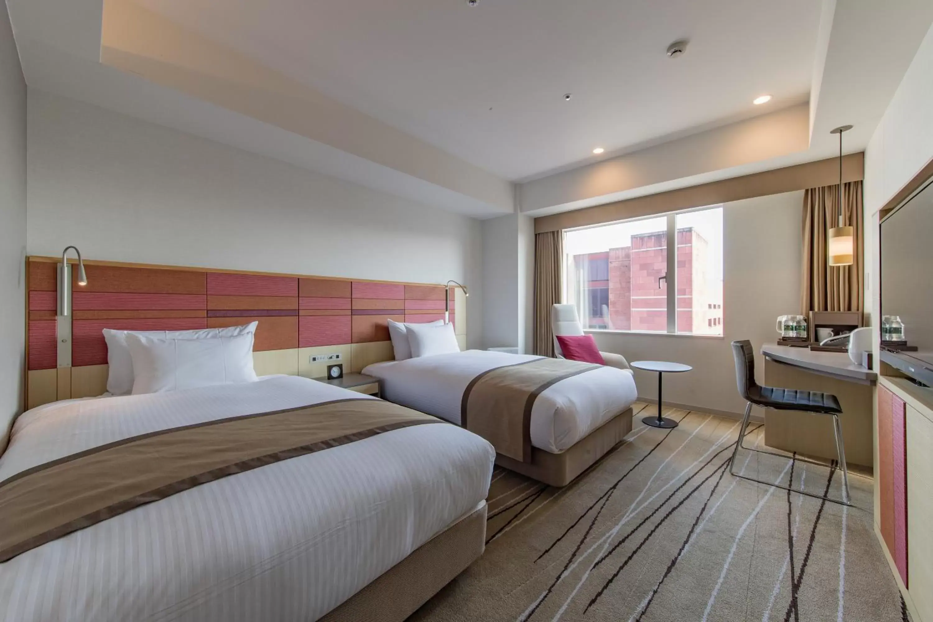 Photo of the whole room, Bed in JR Kyushu Hotel Blossom Hakata Central