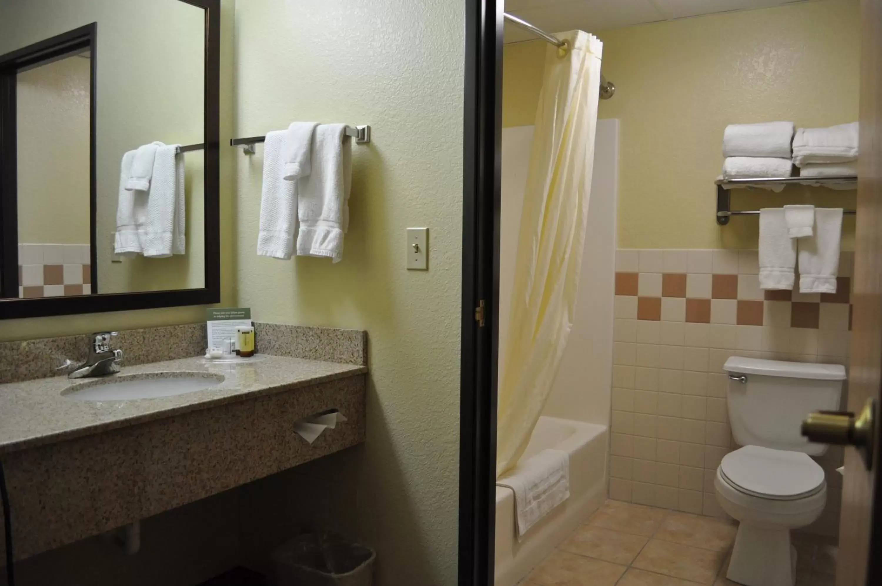 Bathroom in AmericInn by Wyndham Cedar Falls