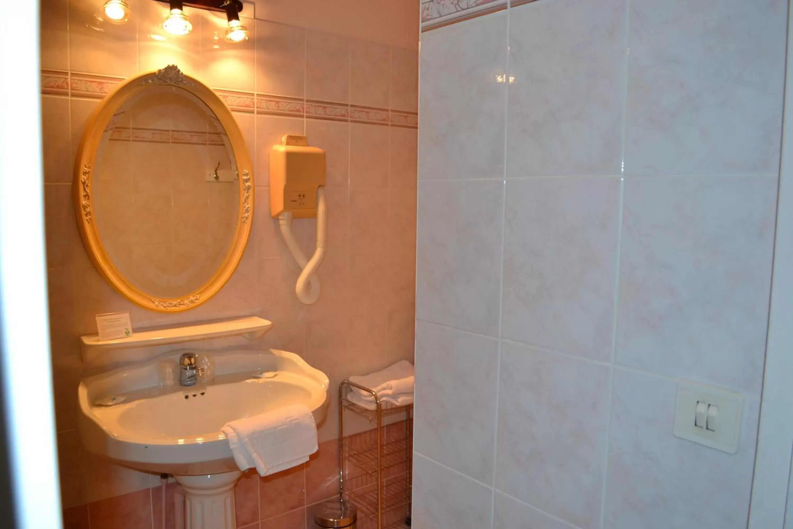 Bathroom in Hôtel Le Castel