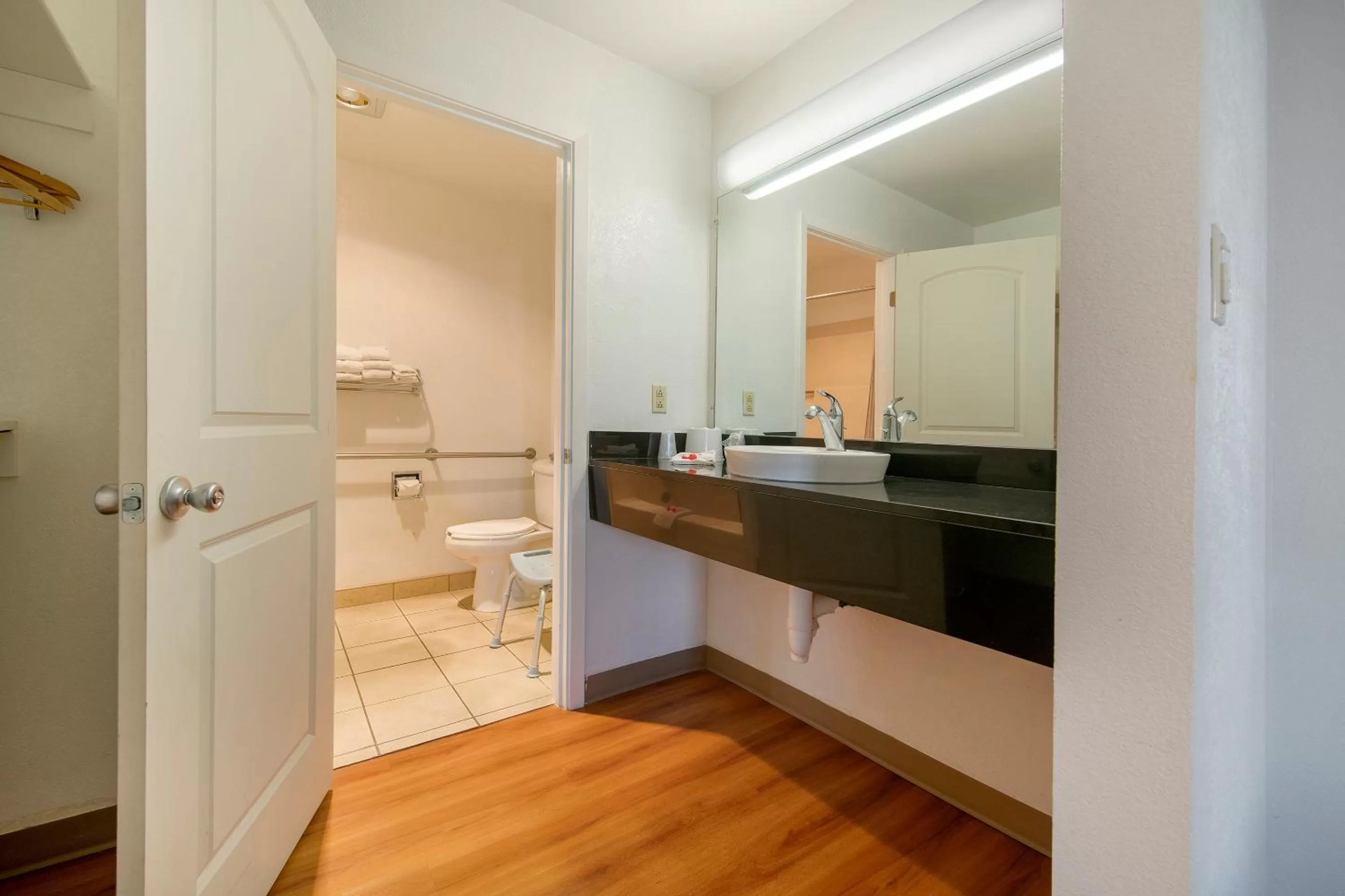 Bathroom in Super 8 by Wyndham Dunnigan